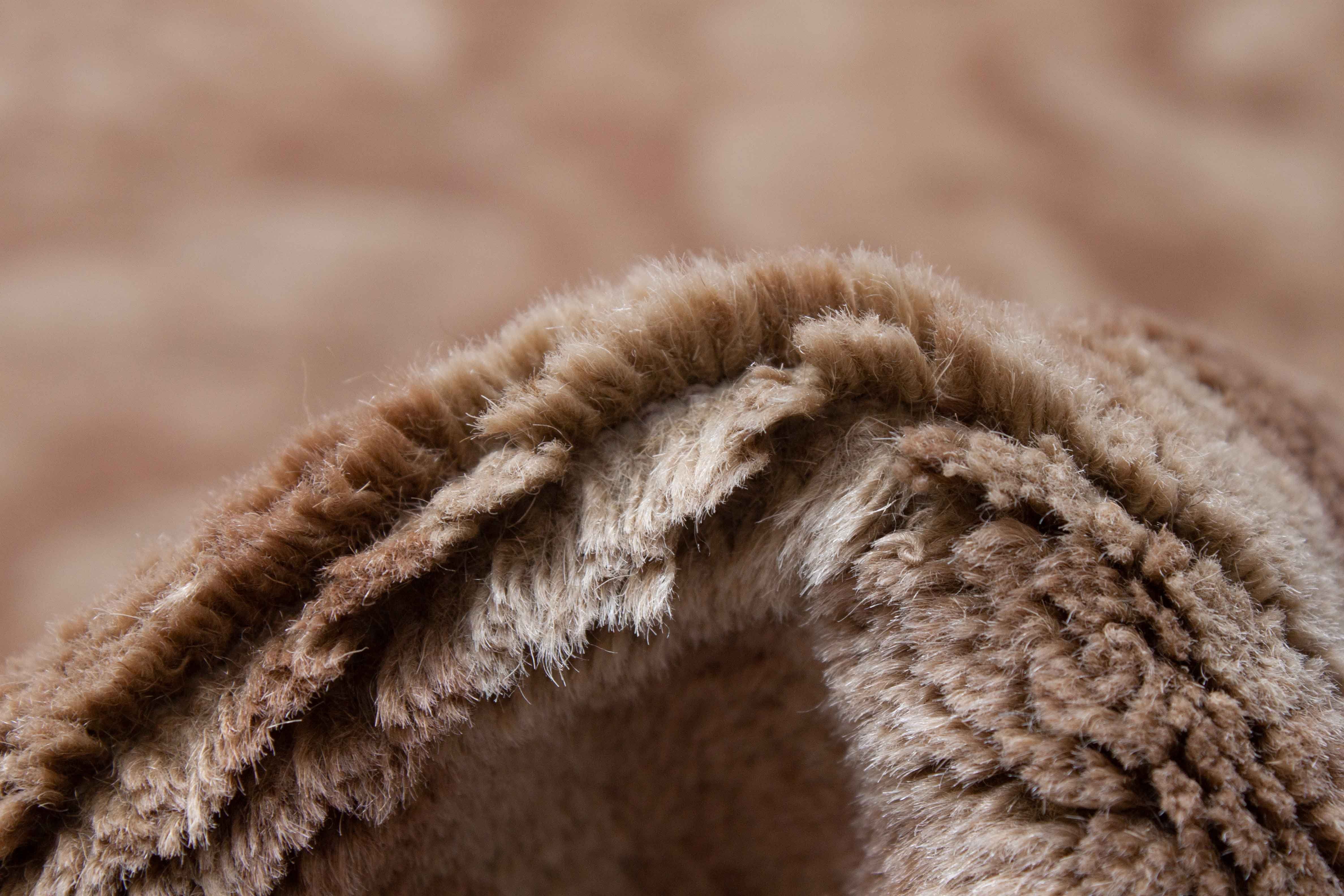 Eine Fotoaufnahme eines US Import China Teppich Teppichs.