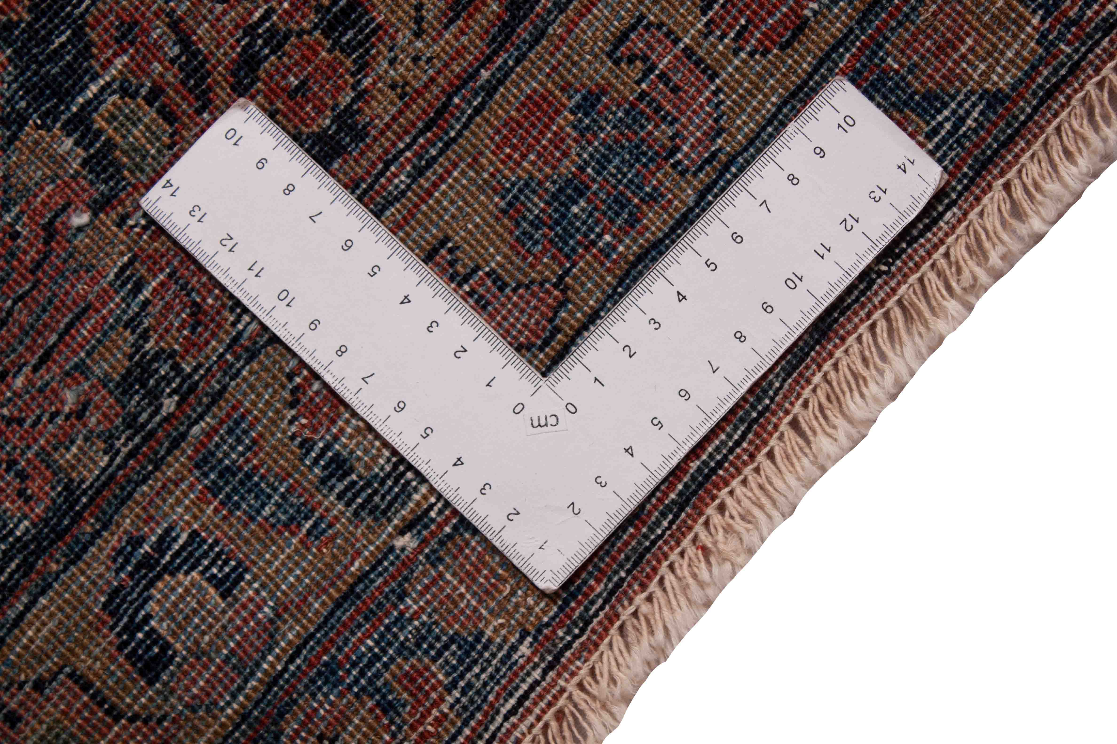 Eine Fotoaufnahme eines Re-Import Sarough Teppichs.