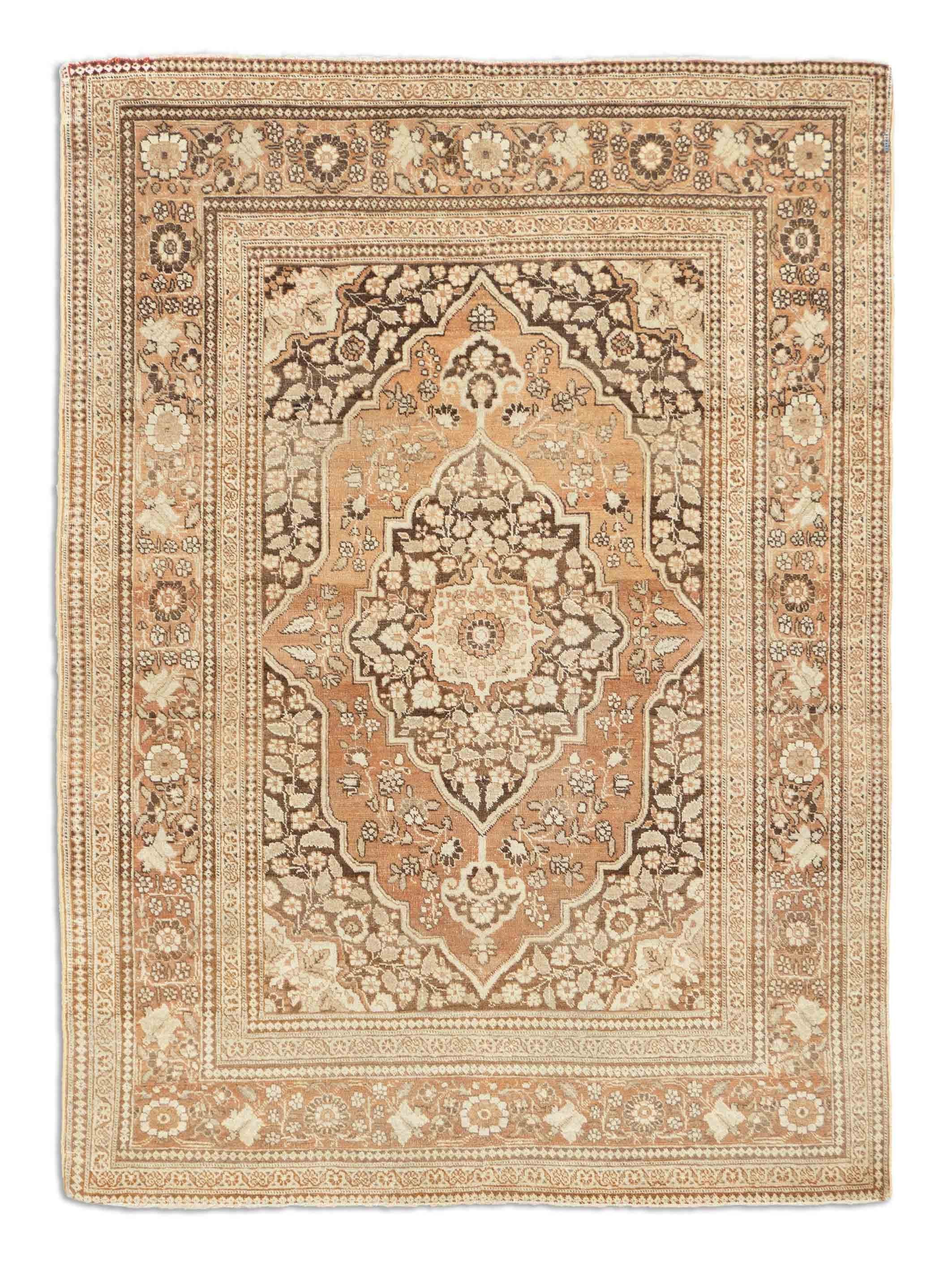 Eine Fotoaufnahme eines Täbriz Teppichs.