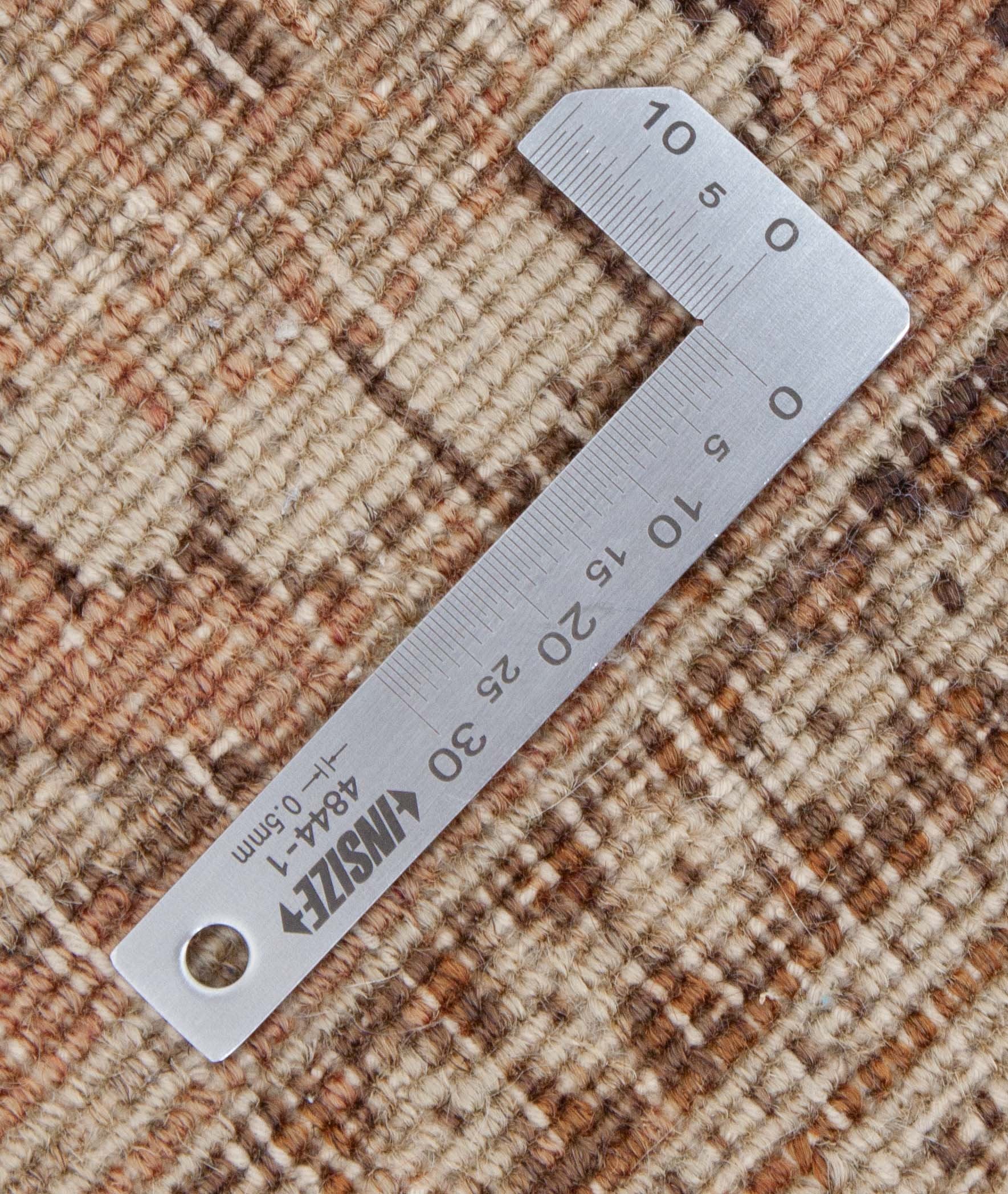 Eine Fotoaufnahme eines Täbriz Teppichs.