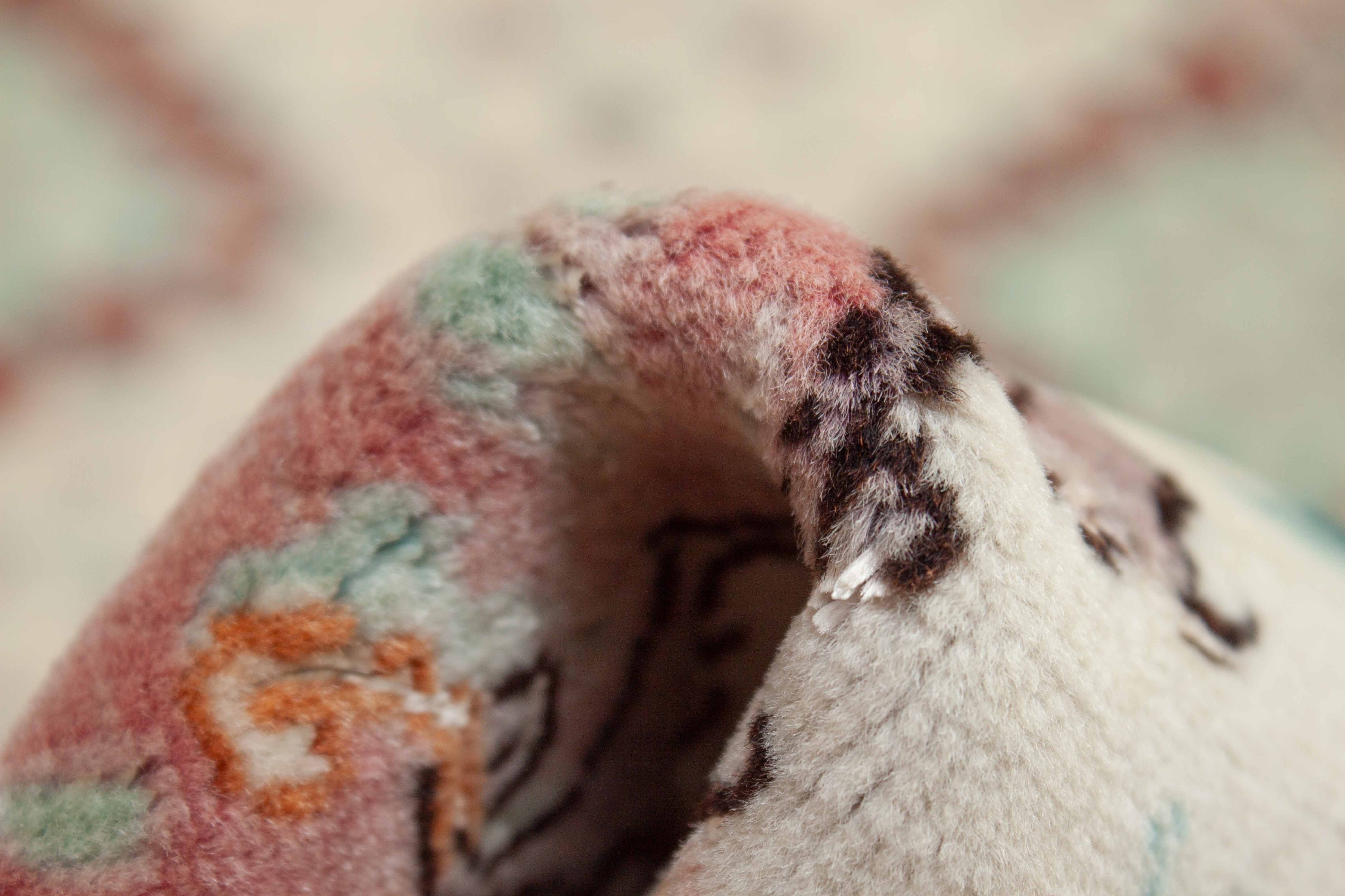 Eine Fotoaufnahme eines Täbriz Teppichs.