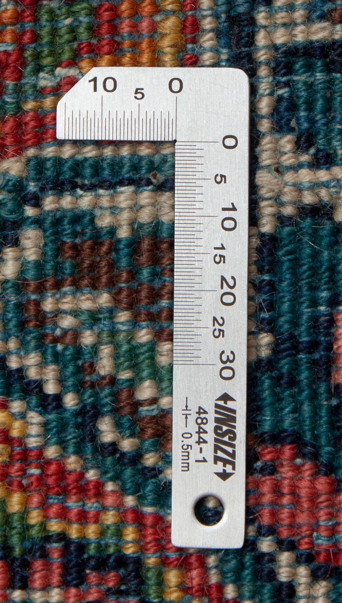 Eine Fotoaufnahme eines Sarough Teppichs.