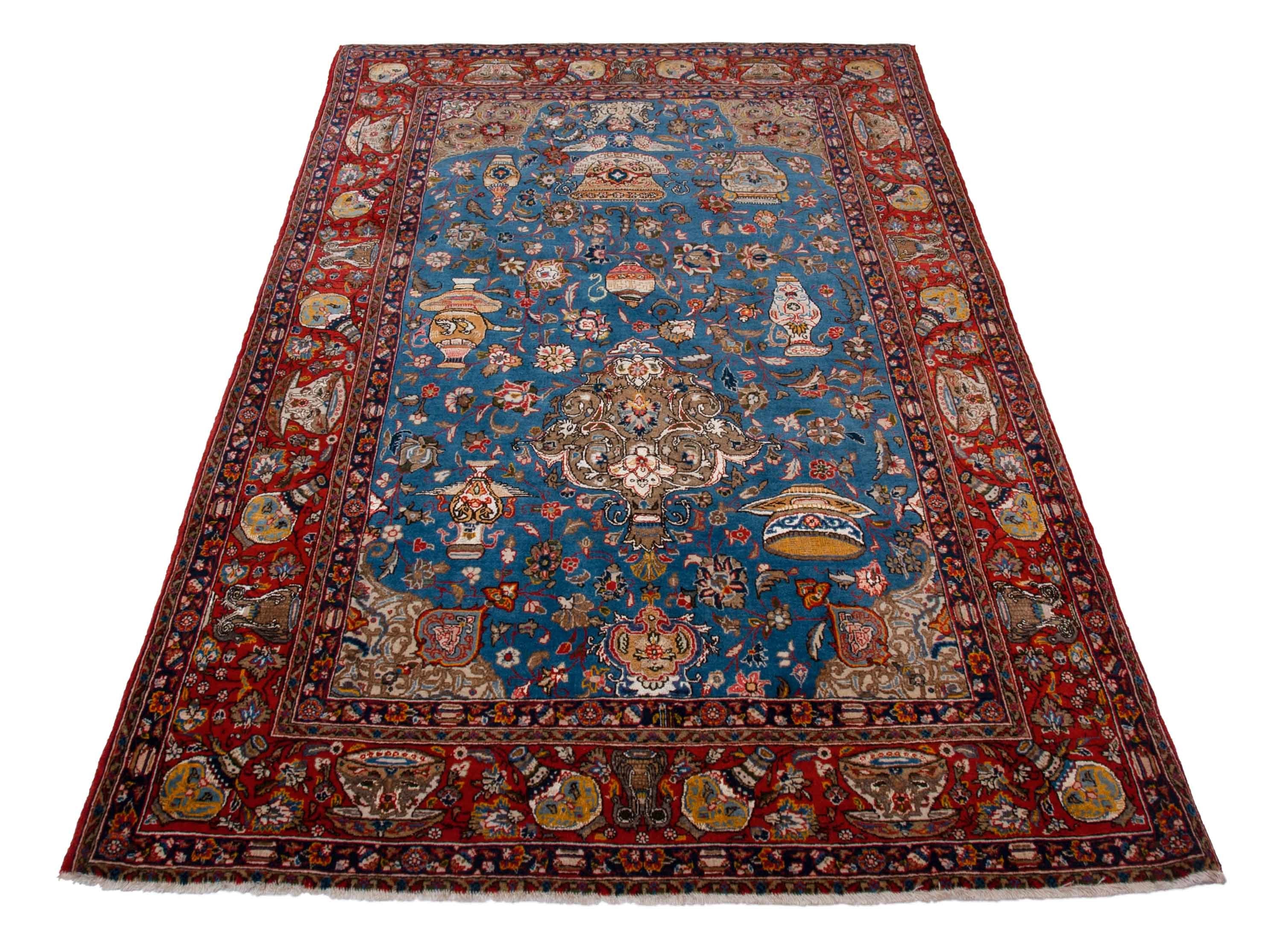 Eine Fotoaufnahme eines Ghom Teppichs.