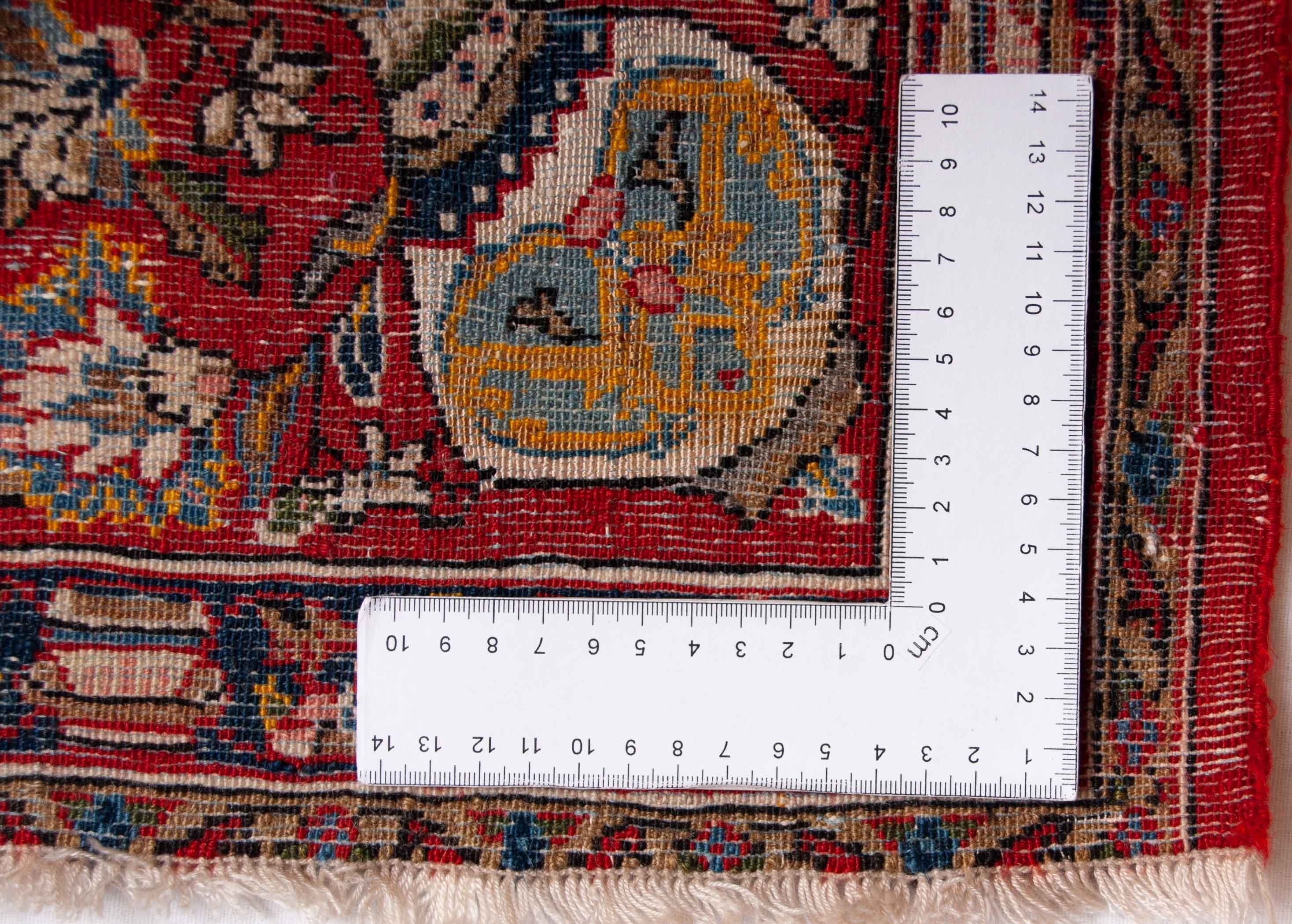 Eine Fotoaufnahme eines Ghom Teppichs.