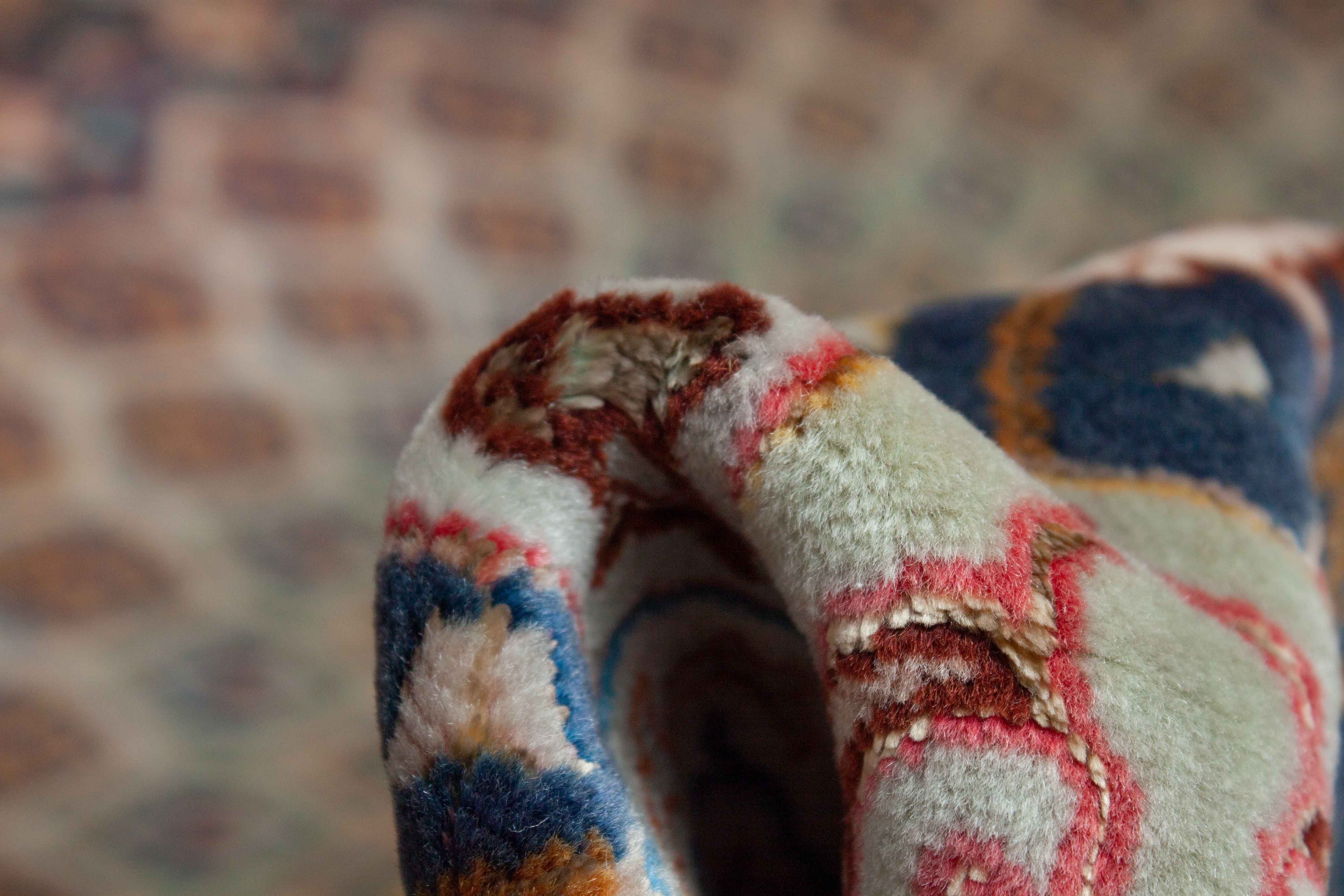 Eine Fotoaufnahme eines Täbriz Teppichs.