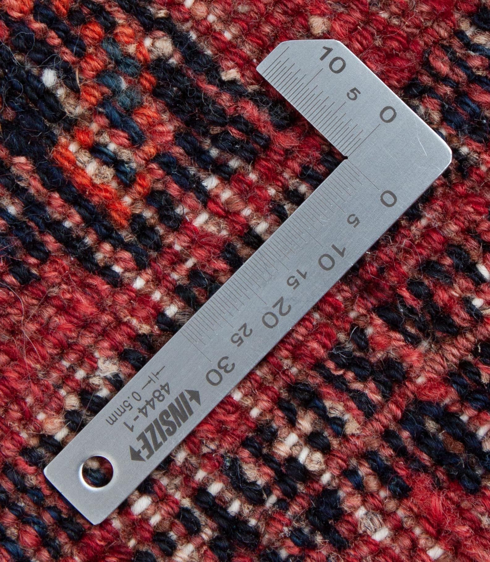 Eine Fotoaufnahme eines Koliai Teppichs.