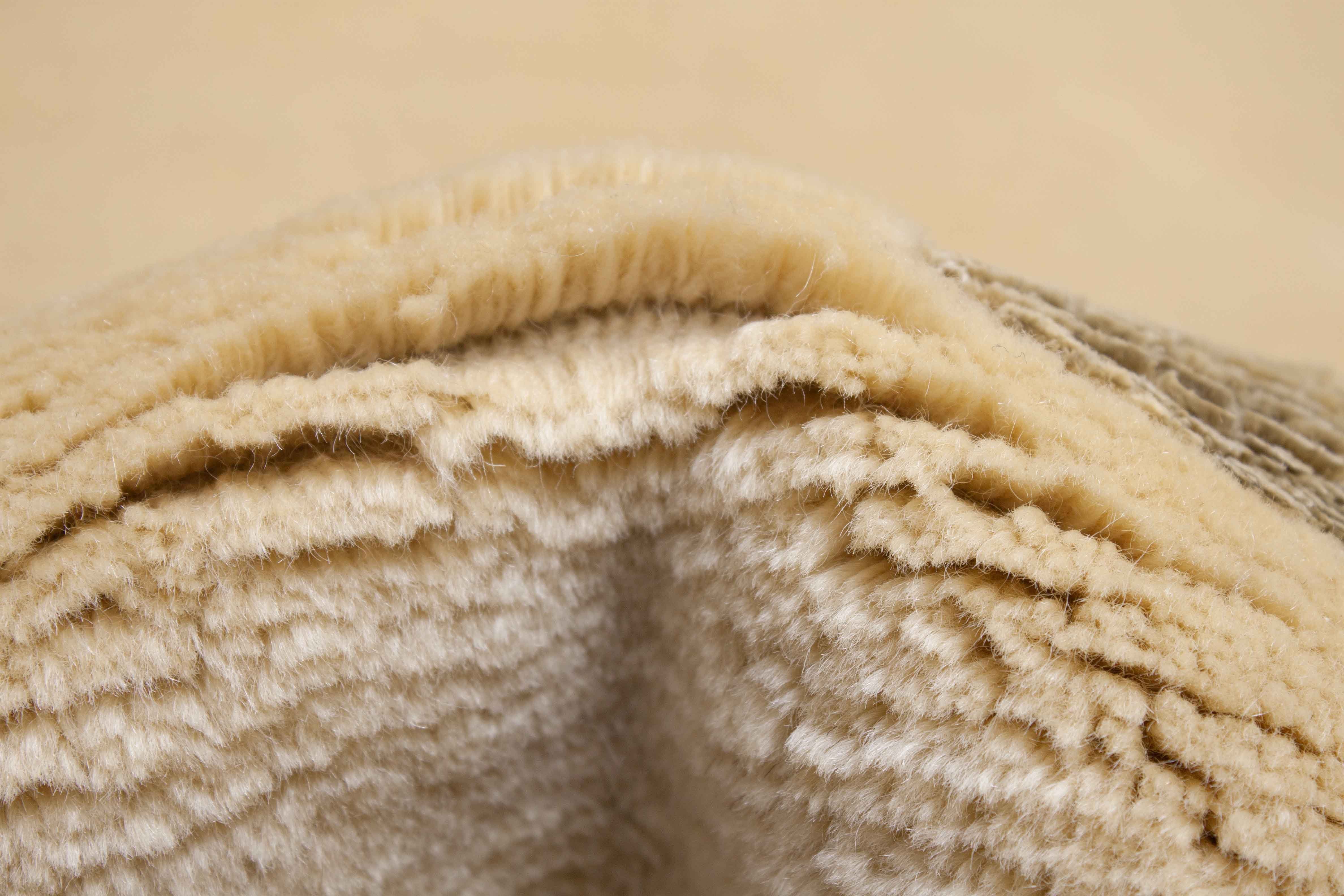 Eine Fotoaufnahme eines Nepal Teppich Teppichs.