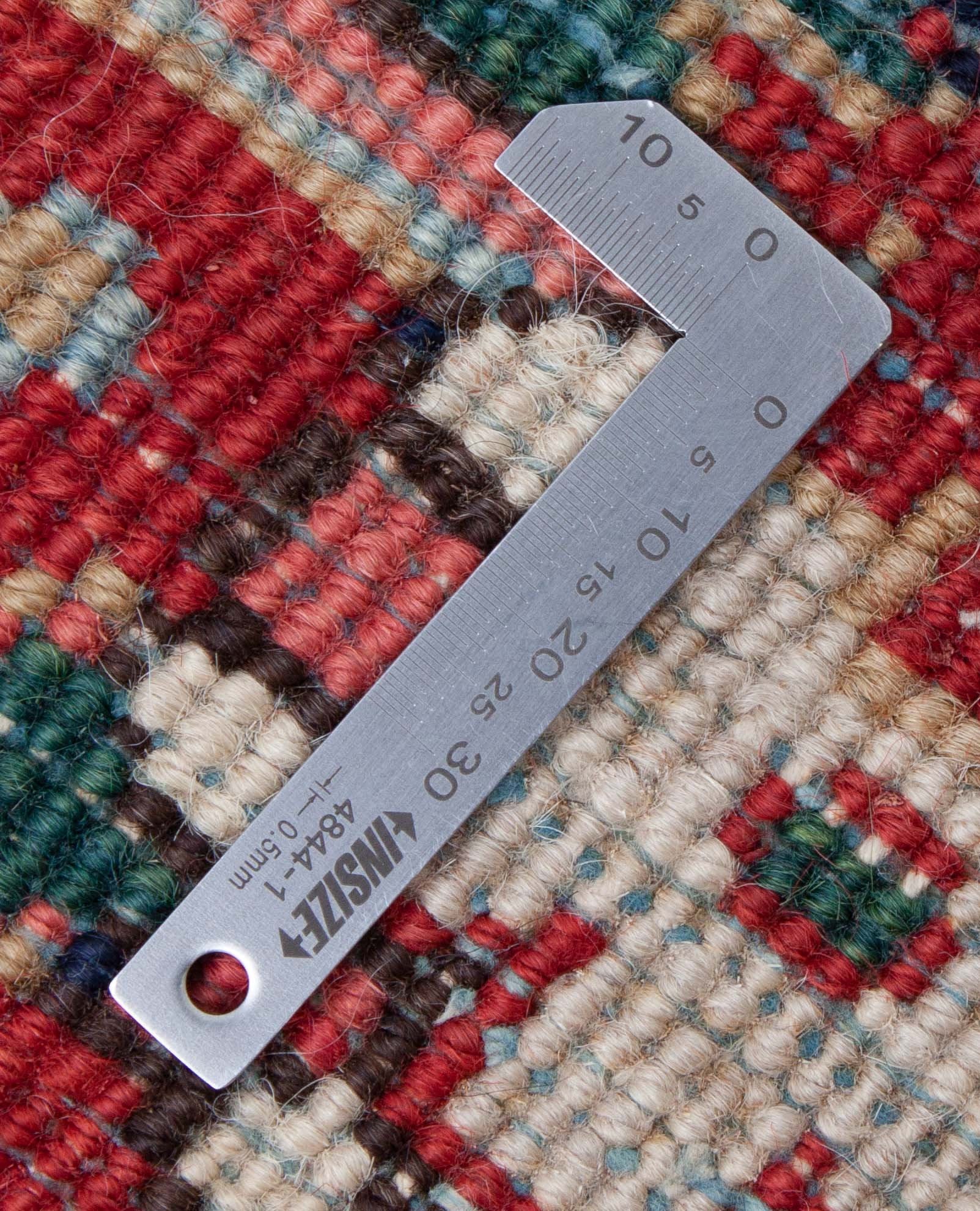 Eine Fotoaufnahme eines Heriz Teppichs.