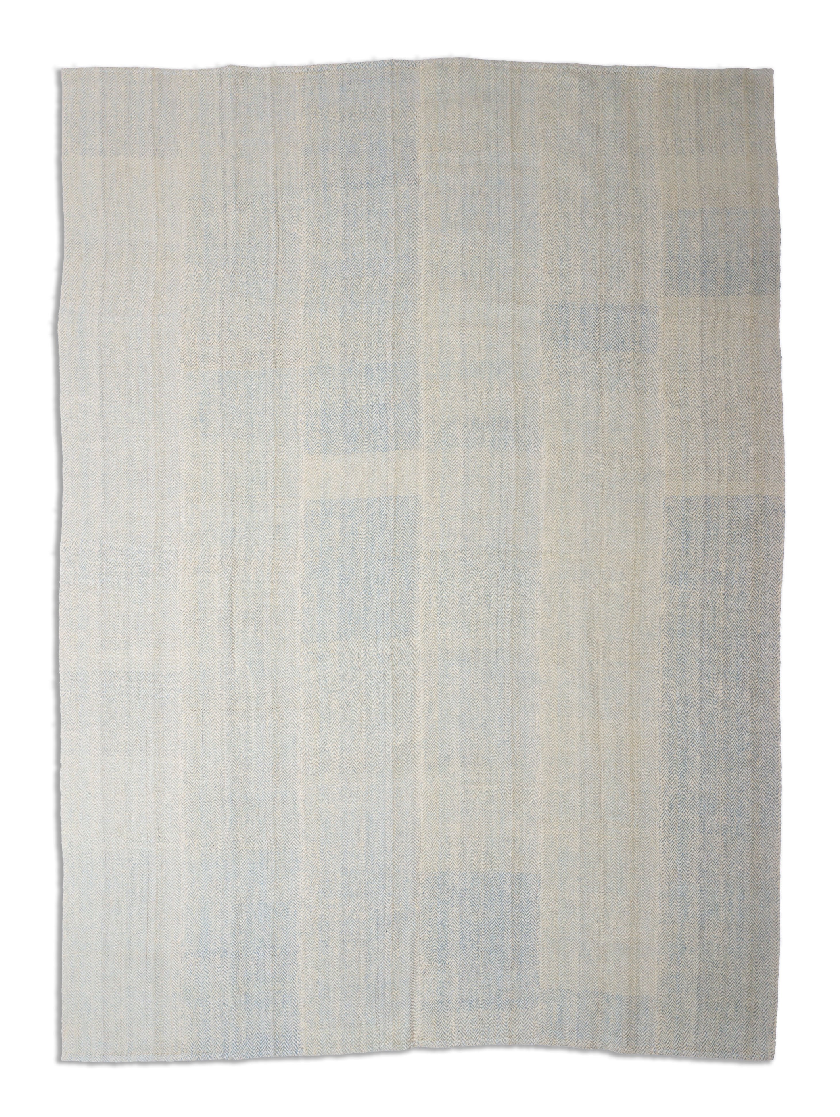 Eine Fotoaufnahme eines Kelim Teppichs.