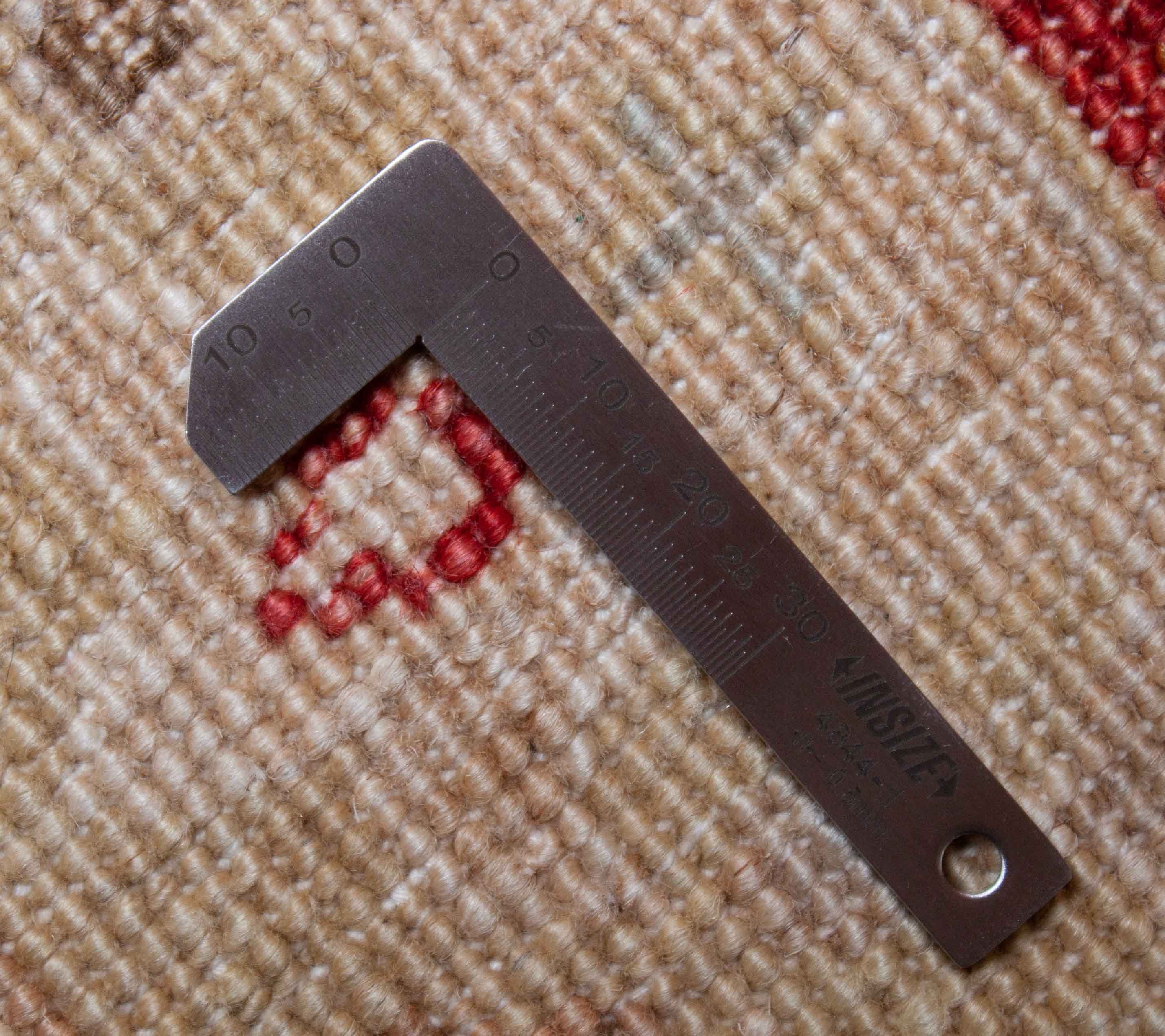 Eine Fotoaufnahme eines Farahan Teppichs.