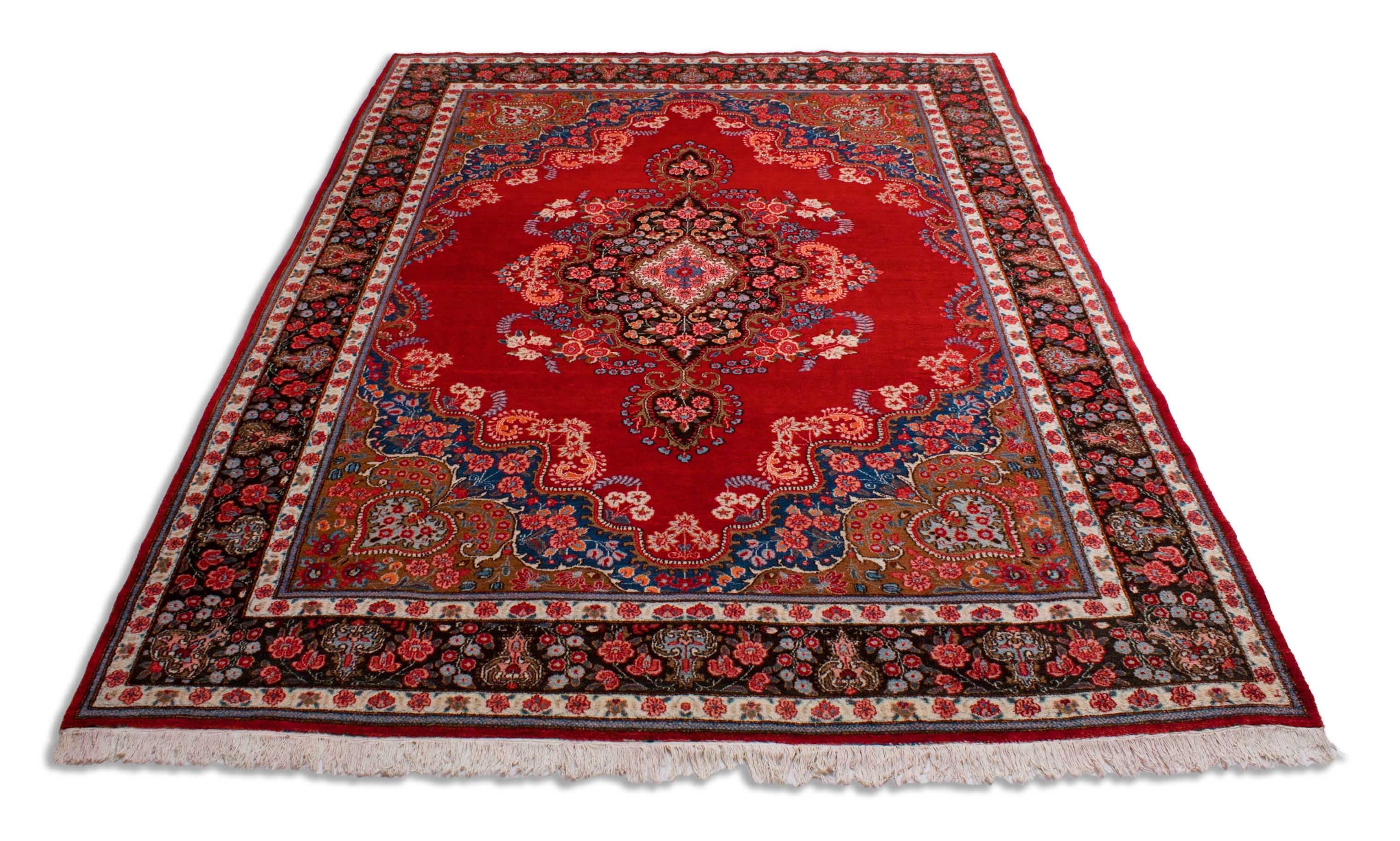 Eine Fotoaufnahme eines Meschad Teppichs.