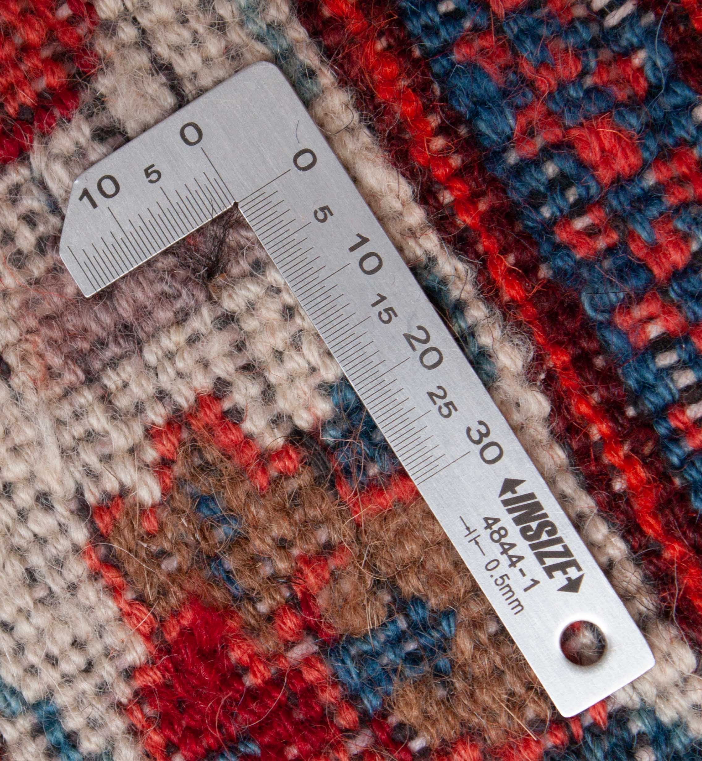 Eine Fotoaufnahme eines Meschad Teppichs.