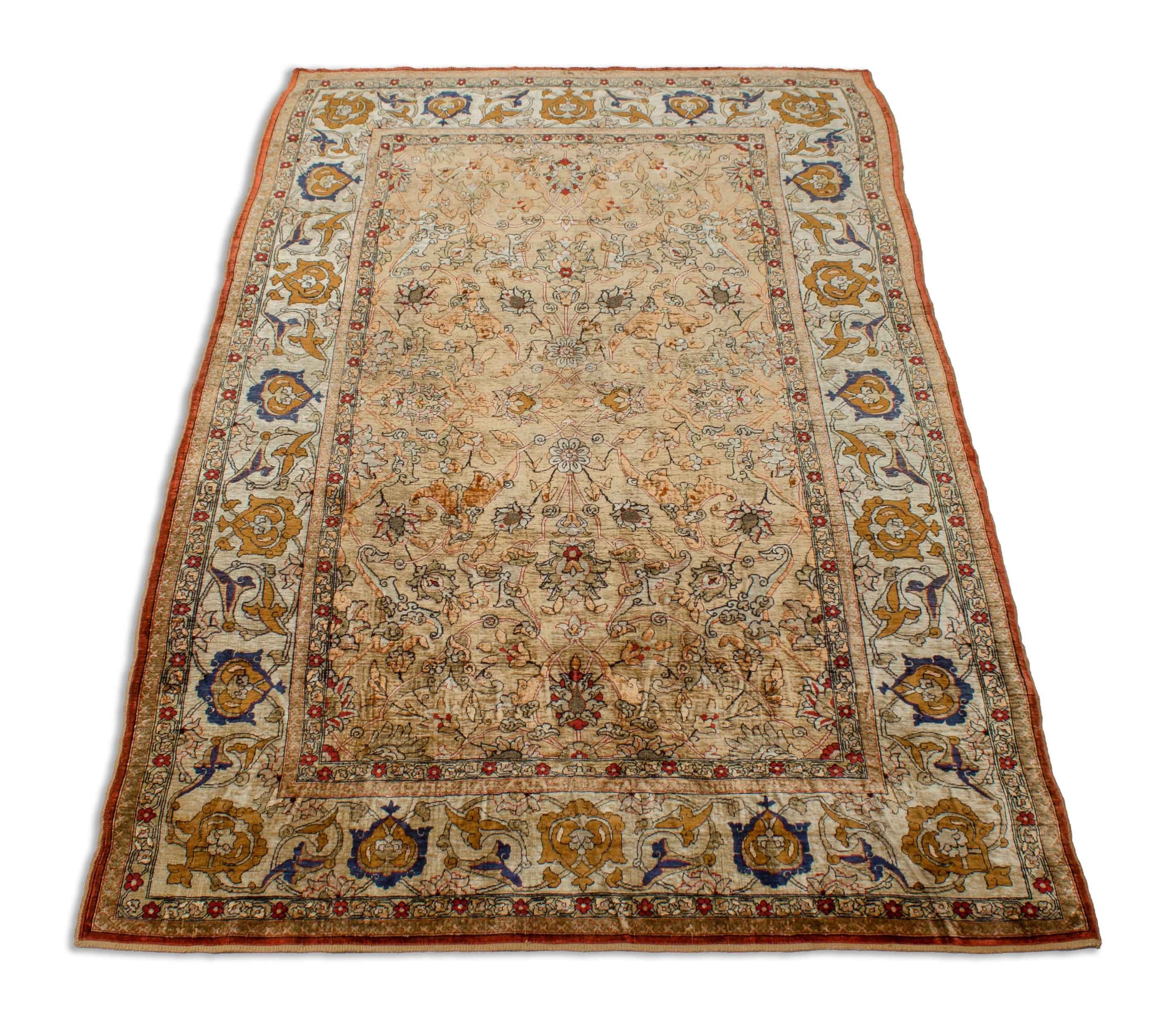 Eine Fotoaufnahme eines Hereke Teppichs.