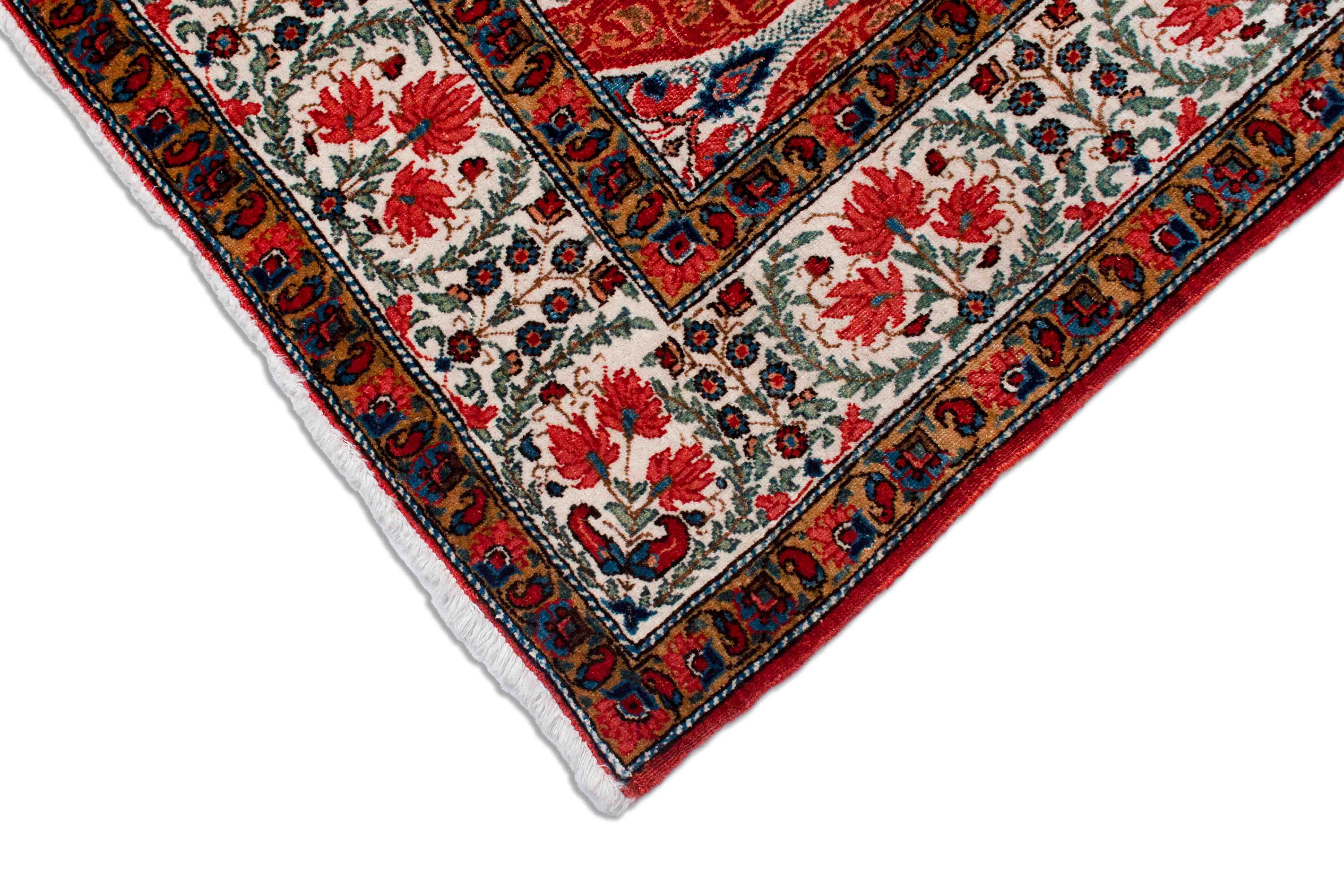 Eine Fotoaufnahme eines Ghom Teppichs.