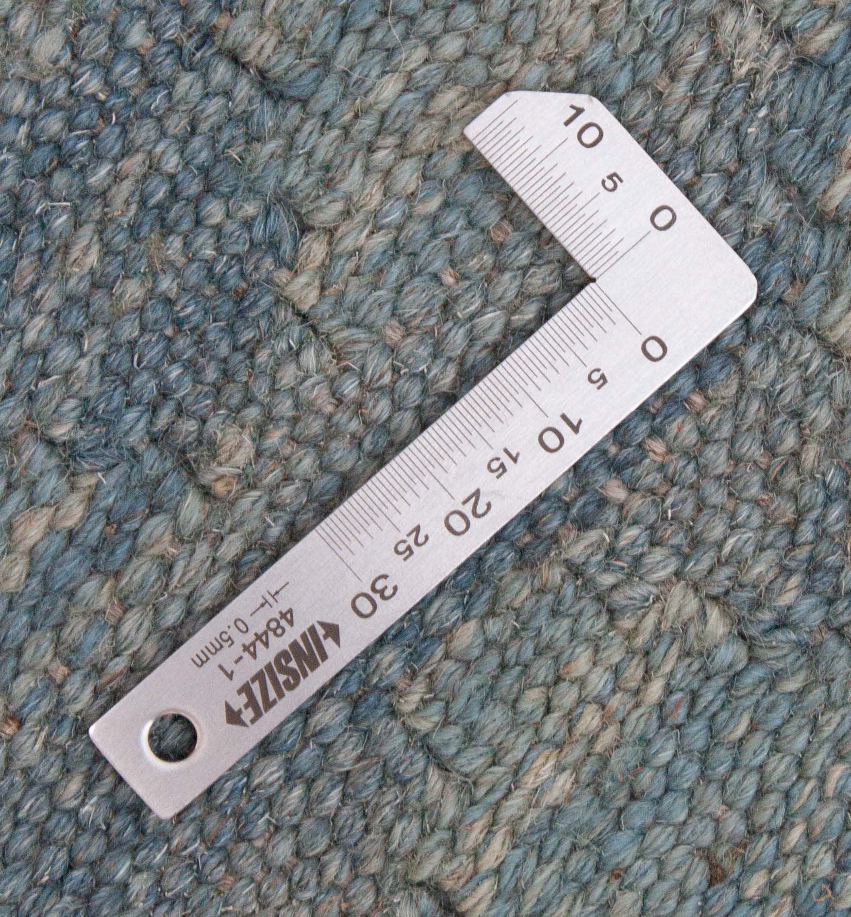 Eine Fotoaufnahme eines Kelim Teppichs.