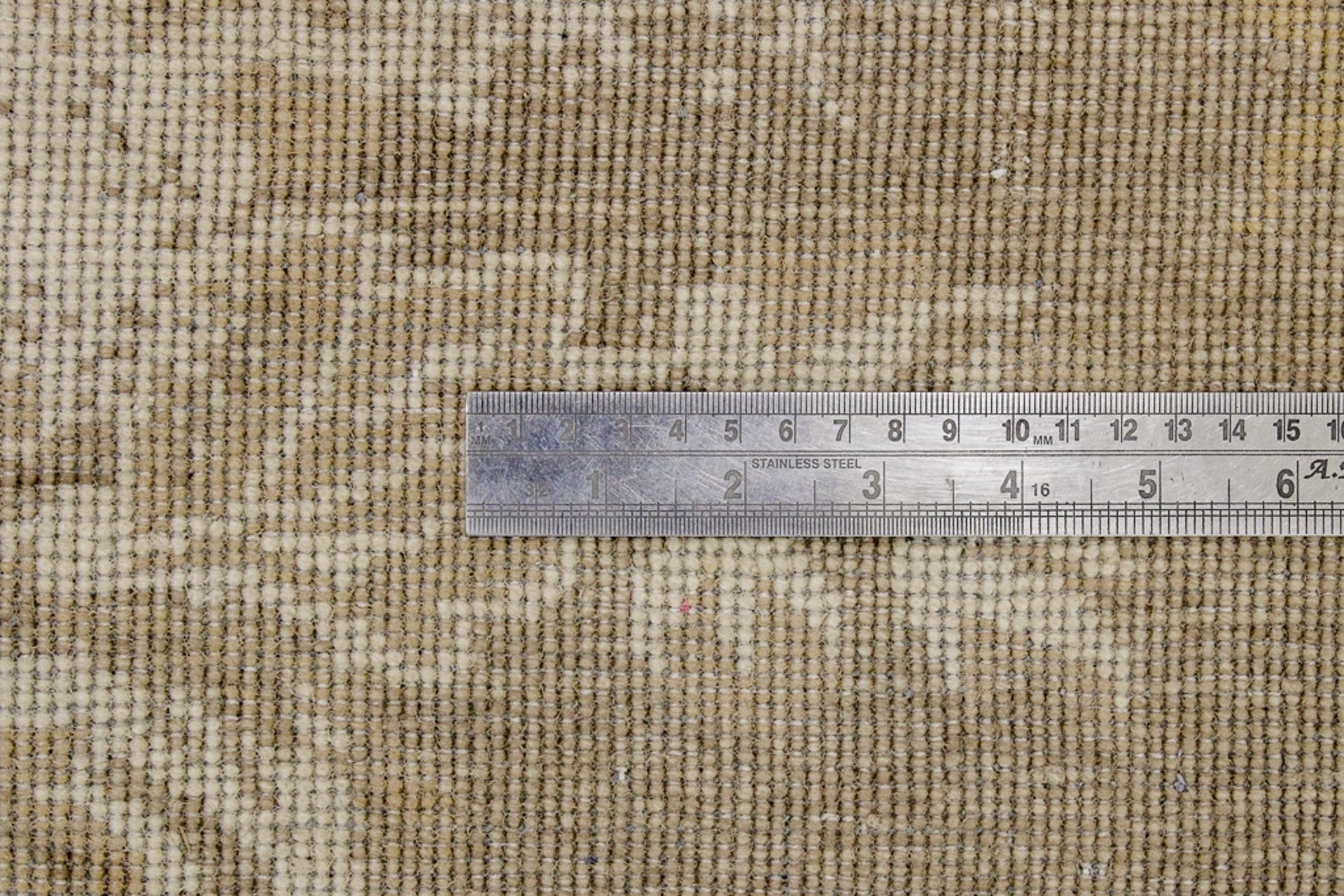 Eine Fotoaufnahme eines Tapis Teppichs.