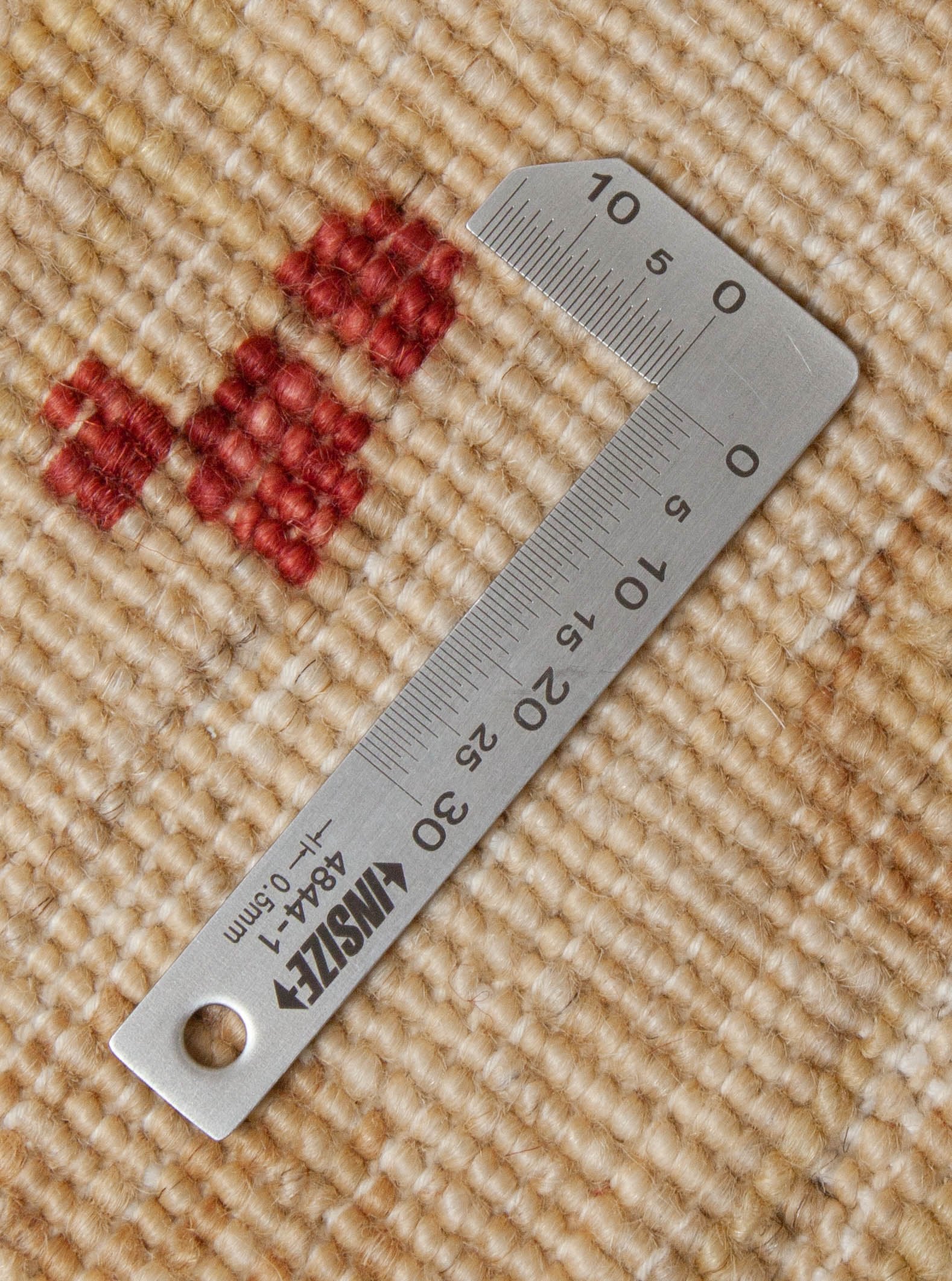 Eine Fotoaufnahme eines Farahan Teppichs.