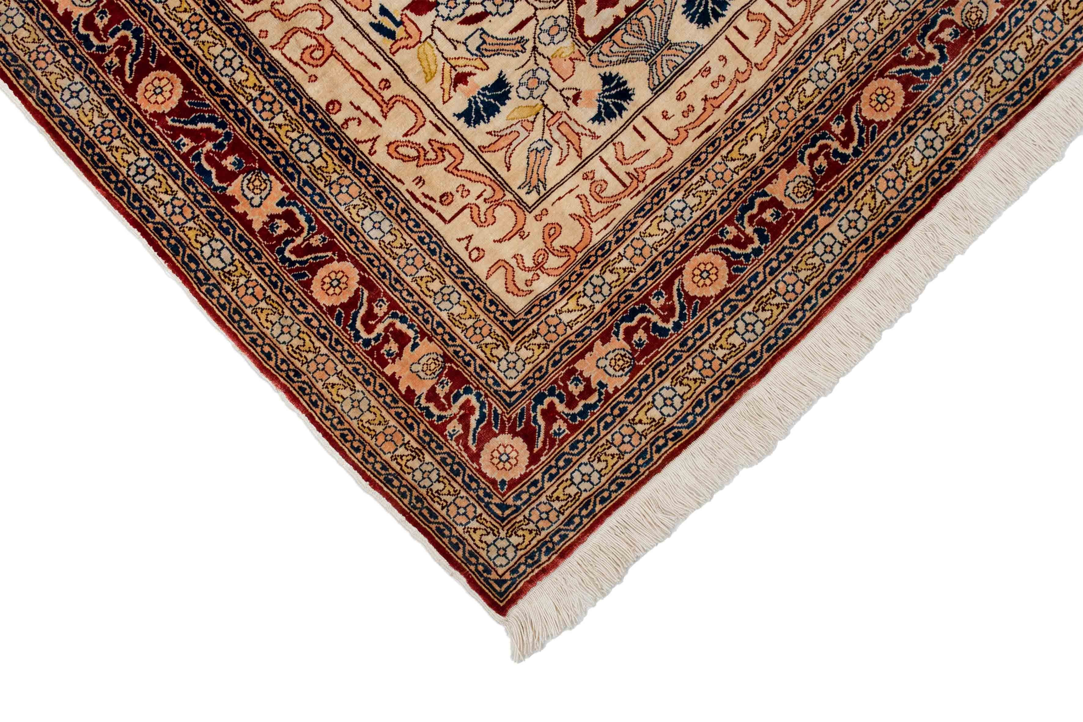 Eine Fotoaufnahme eines Hereke Teppichs.