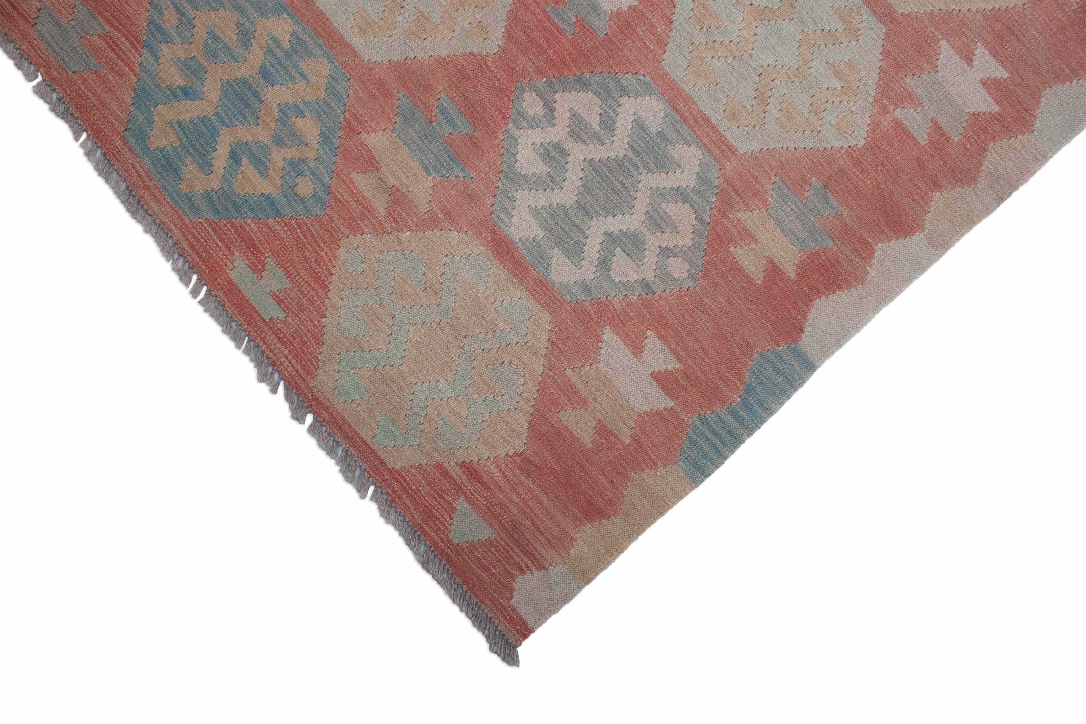 Eine Fotoaufnahme eines Kelim Teppichs.