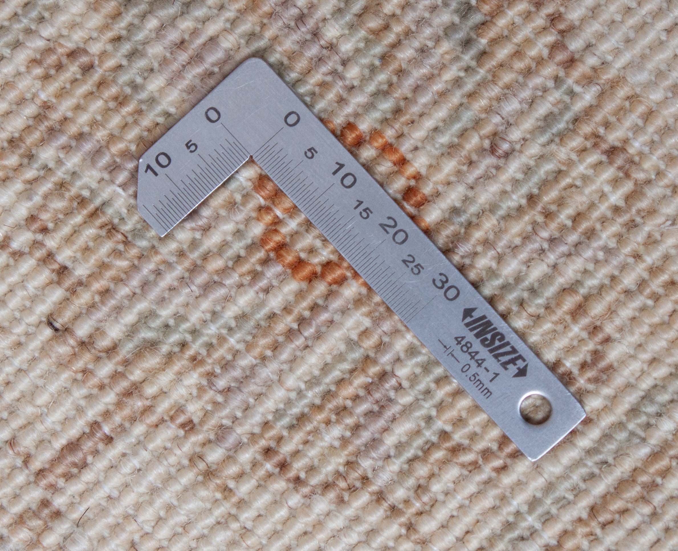 Eine Fotoaufnahme eines Farahan Teppichs.