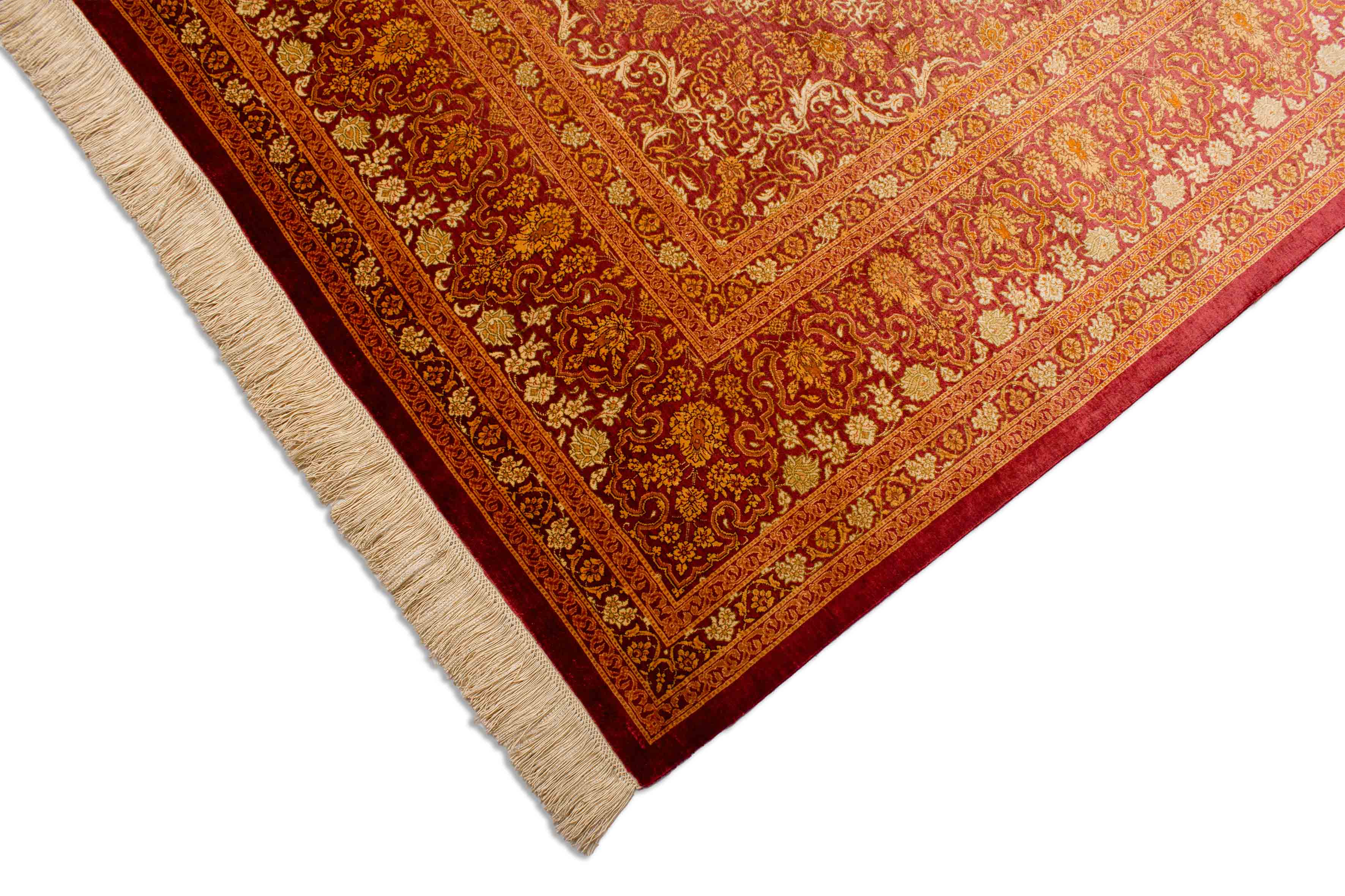 Eine Fotoaufnahme eines Ghom Teppichs.