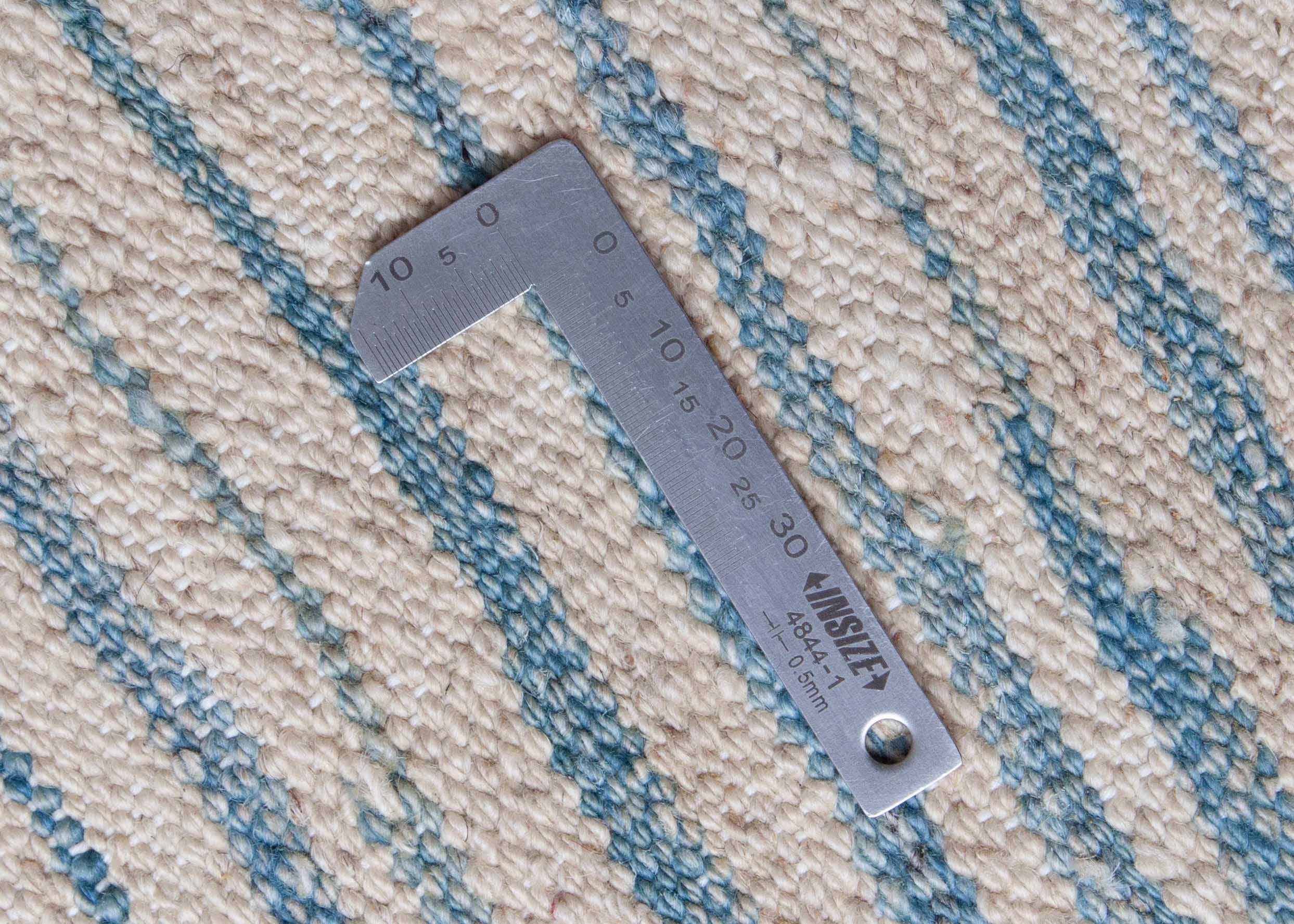 Eine Fotoaufnahme eines Kelim Teppichs.