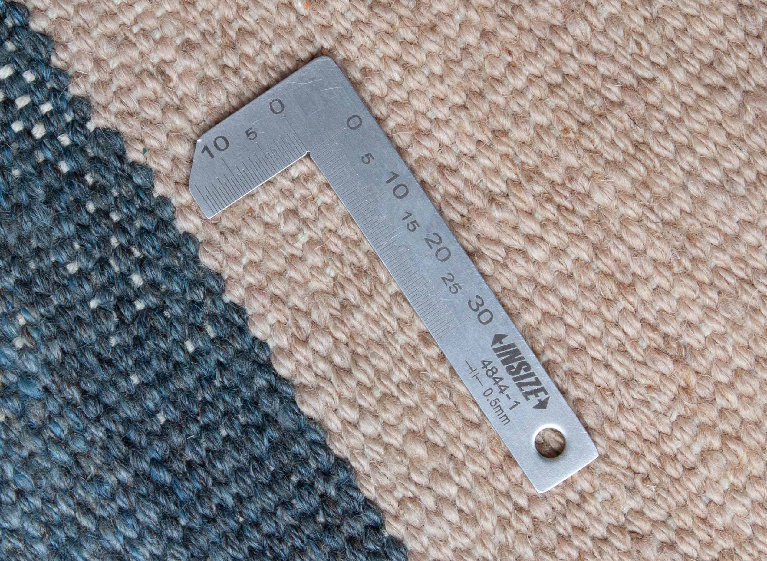 Eine Fotoaufnahme eines Kelim Teppichs.