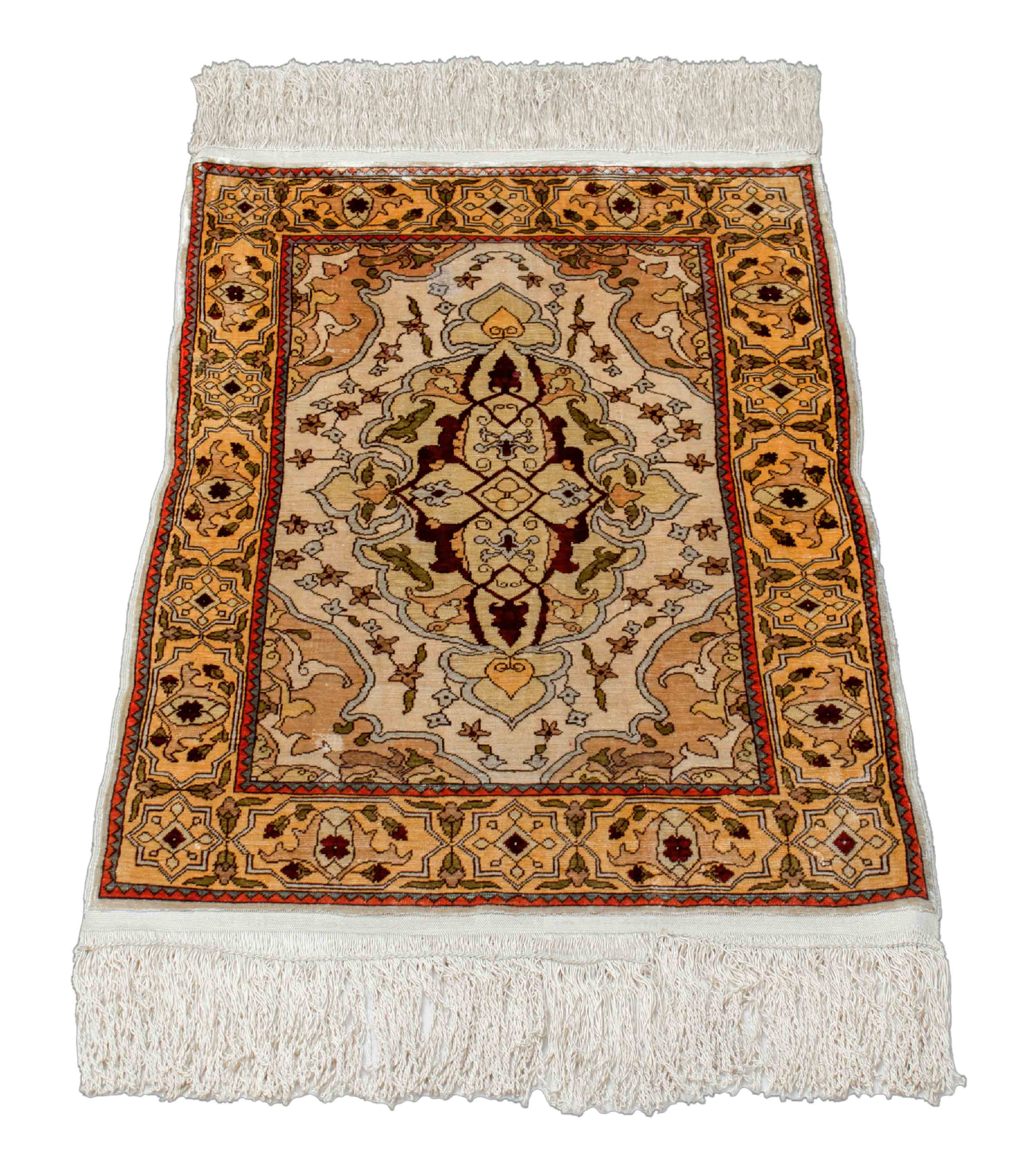 Eine Fotoaufnahme eines Hereke Teppichs.