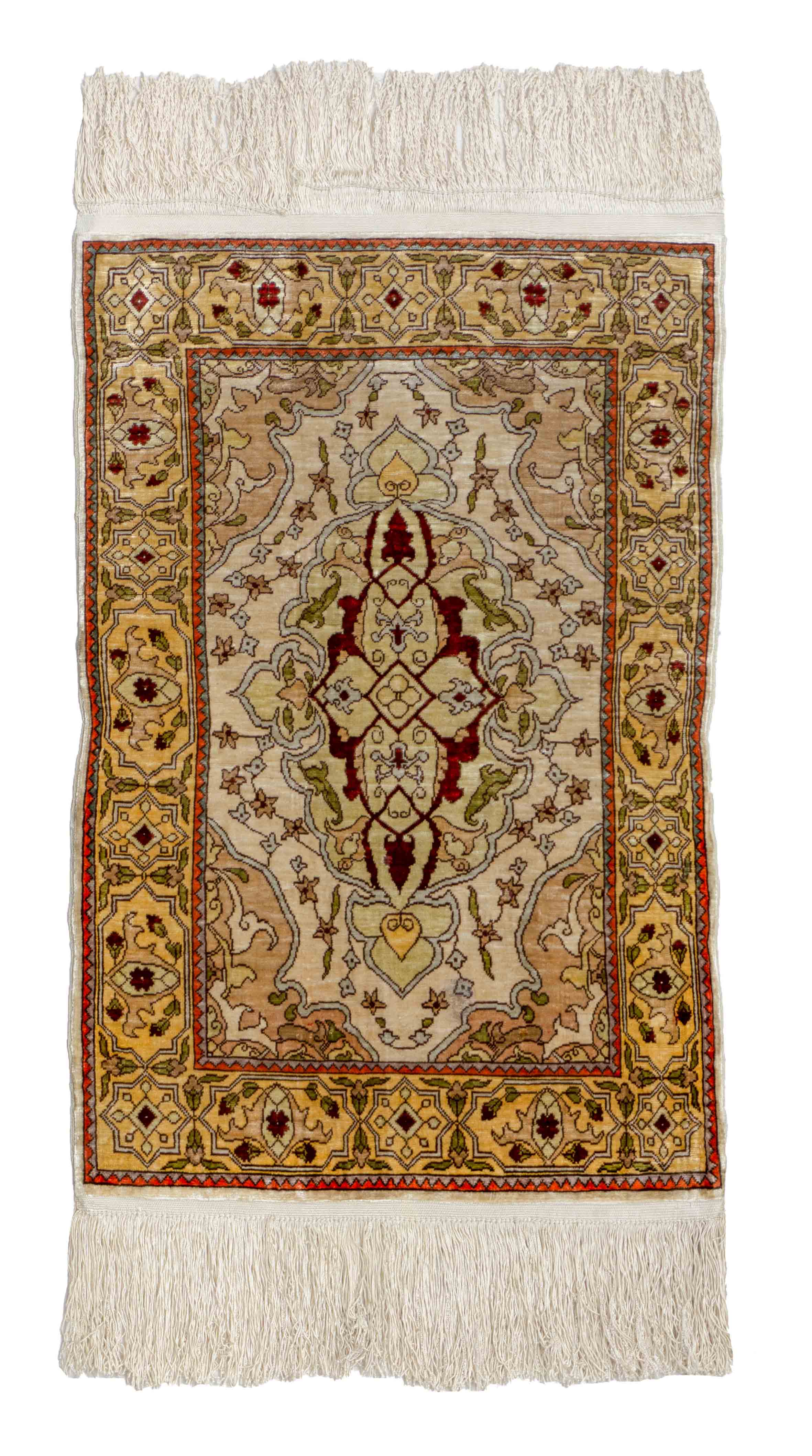 Eine Fotoaufnahme eines Hereke Teppichs.