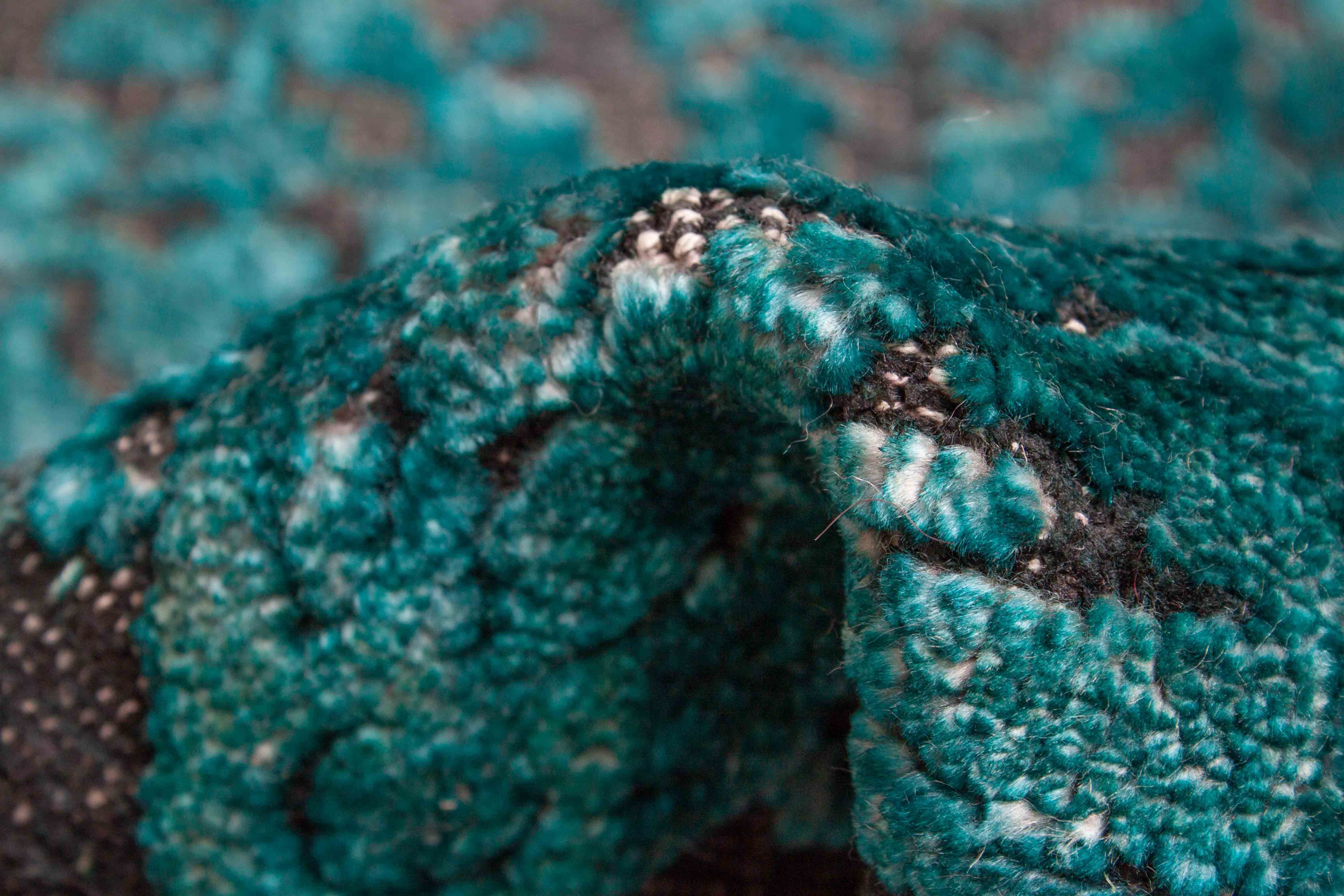 Eine Fotoaufnahme eines Tapis Teppichs.