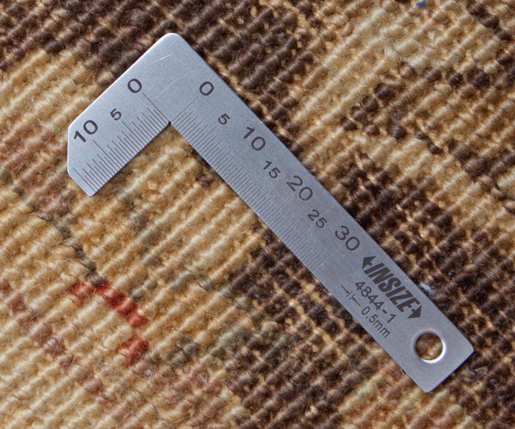 Eine Fotoaufnahme eines Farahan Teppichs.