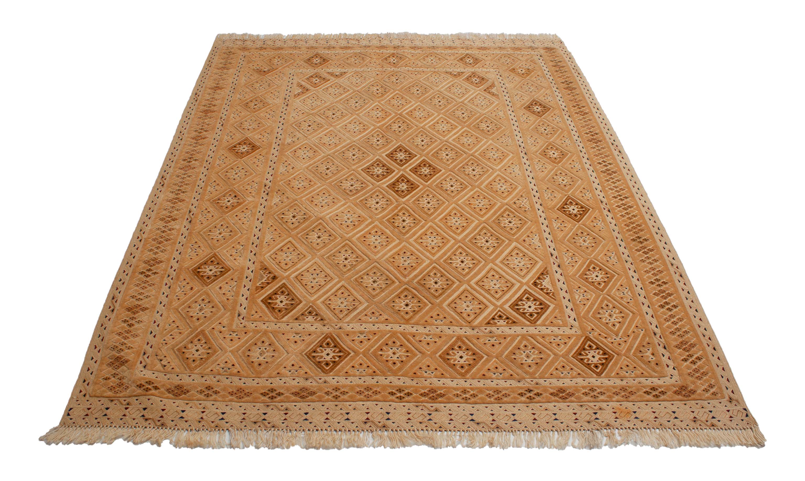 Eine Fotoaufnahme eines Nakhunak Teppichs.