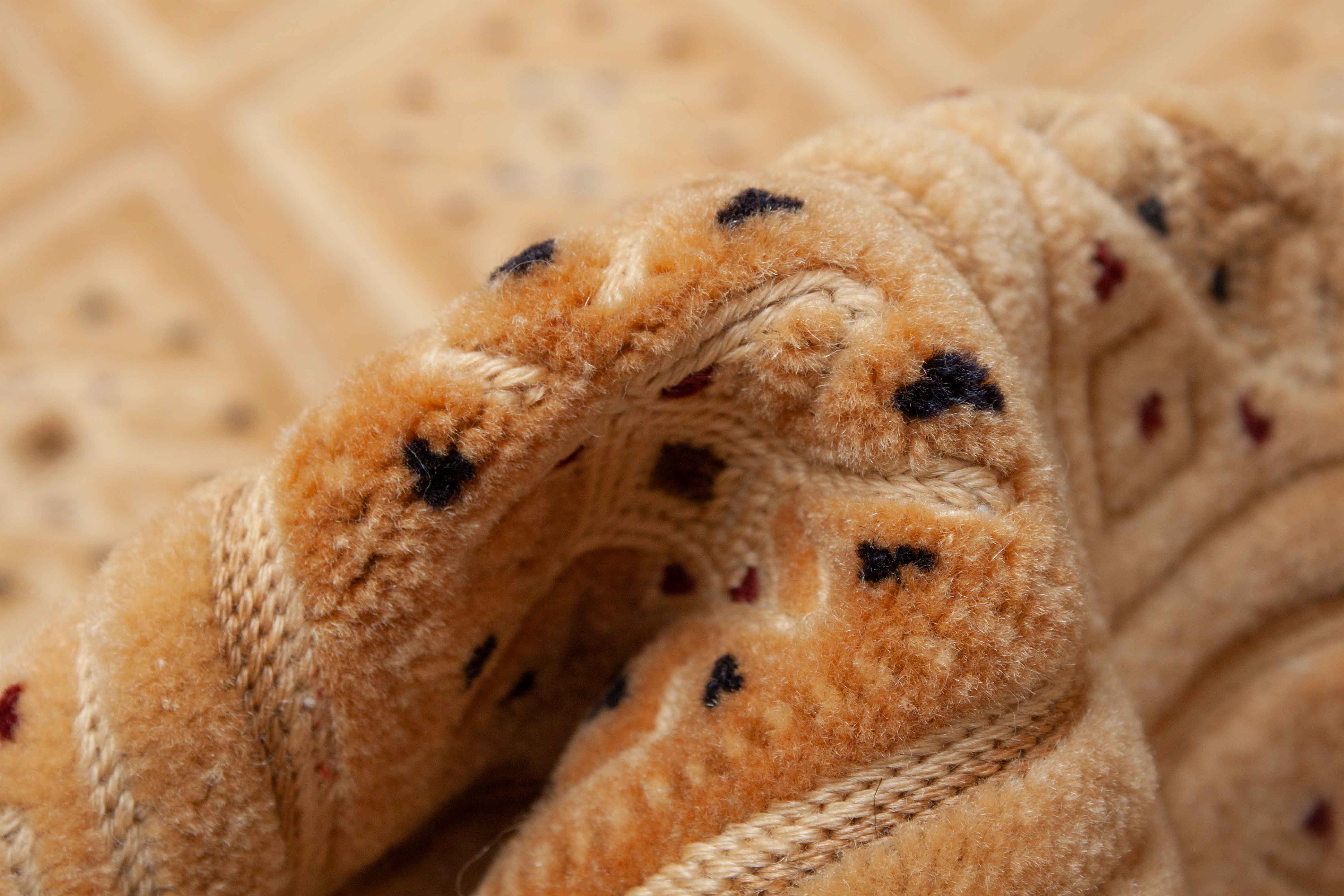 Eine Fotoaufnahme eines Nakhunak Teppichs.