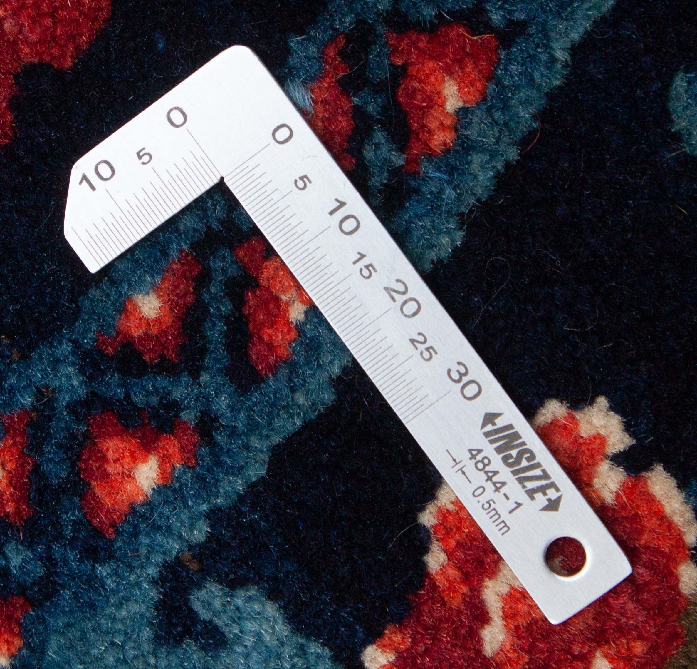 Eine Fotoaufnahme eines Sattelbezug Teppichs.