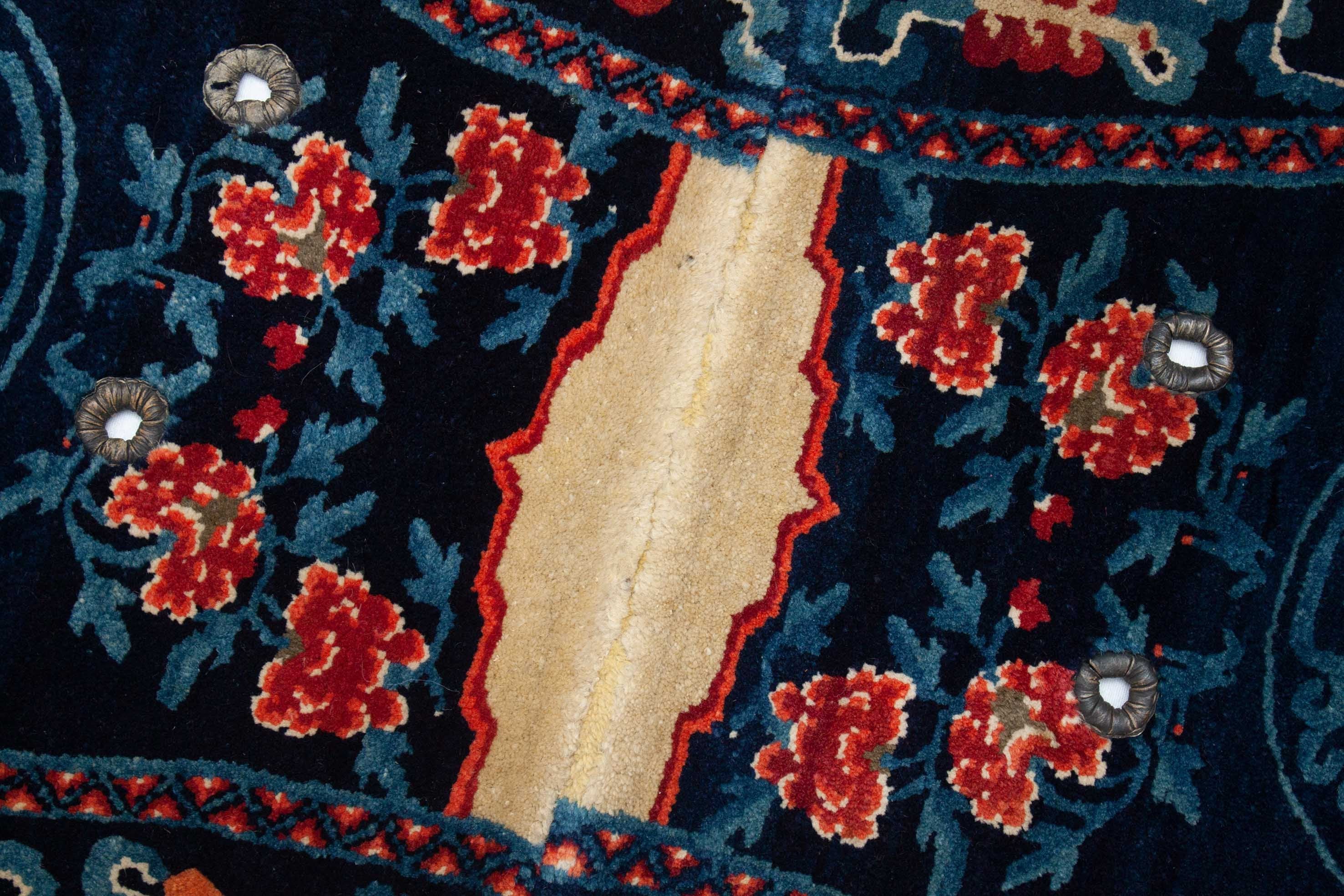 Eine Fotoaufnahme eines Sattelbezug Teppichs.