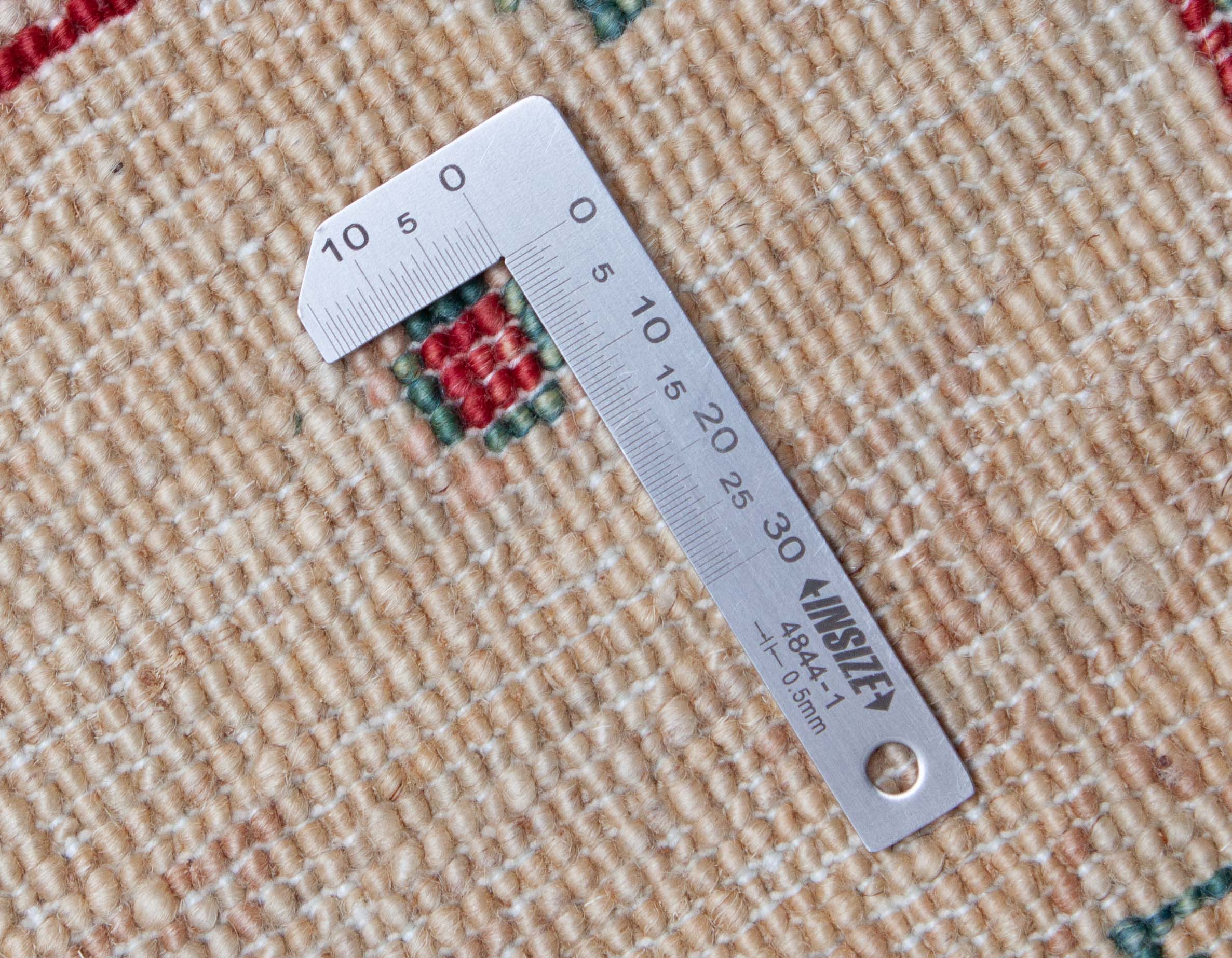 Eine Fotoaufnahme eines Farahan Teppichs.