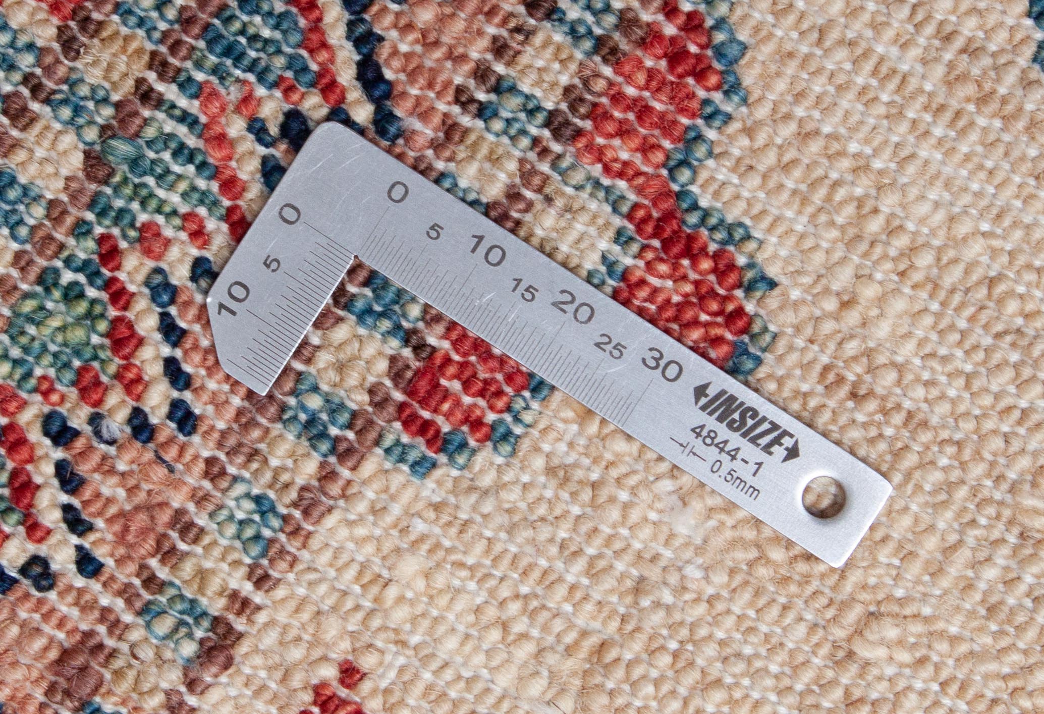 Eine Fotoaufnahme eines Kazak Teppichs.