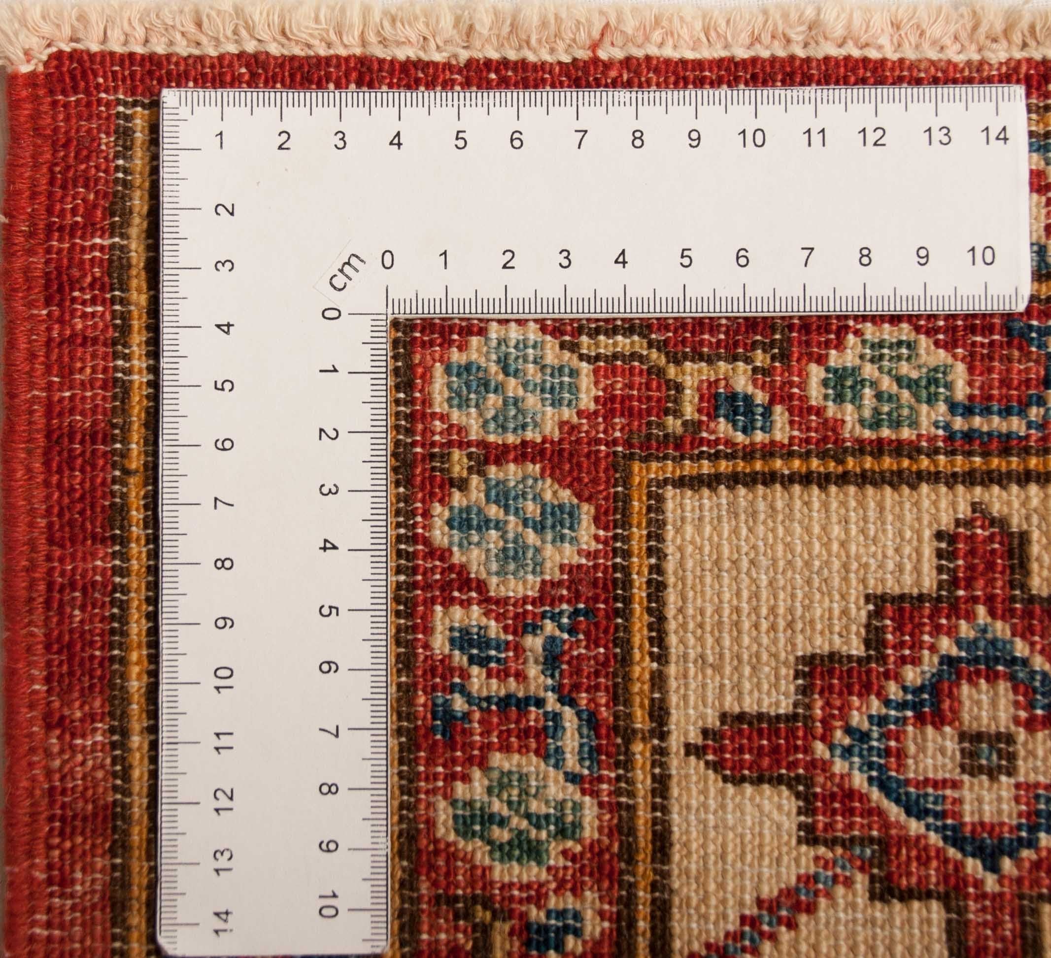 Eine Fotoaufnahme eines Kazak Teppichs.