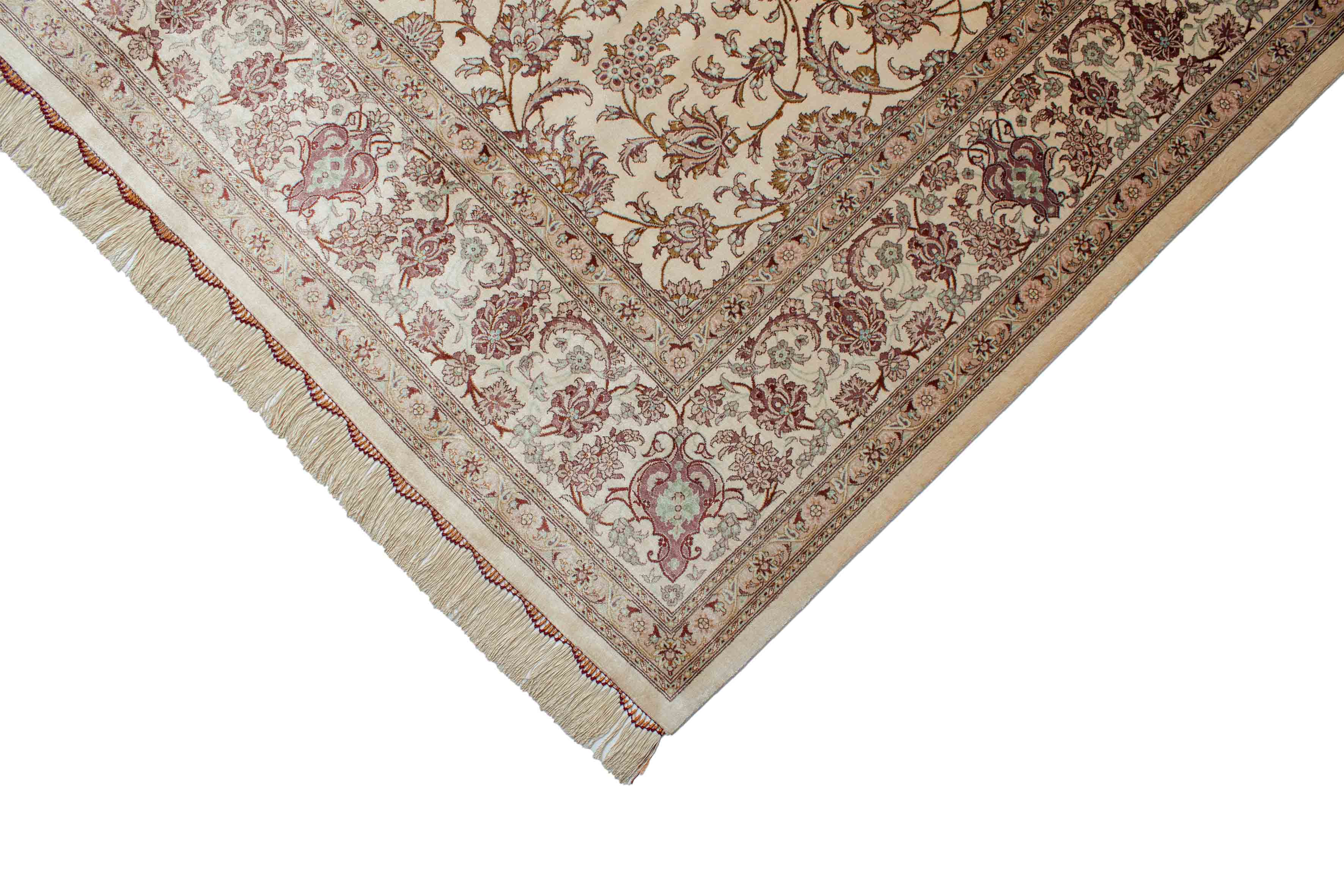 Eine Fotoaufnahme eines Ghom Teppichs.