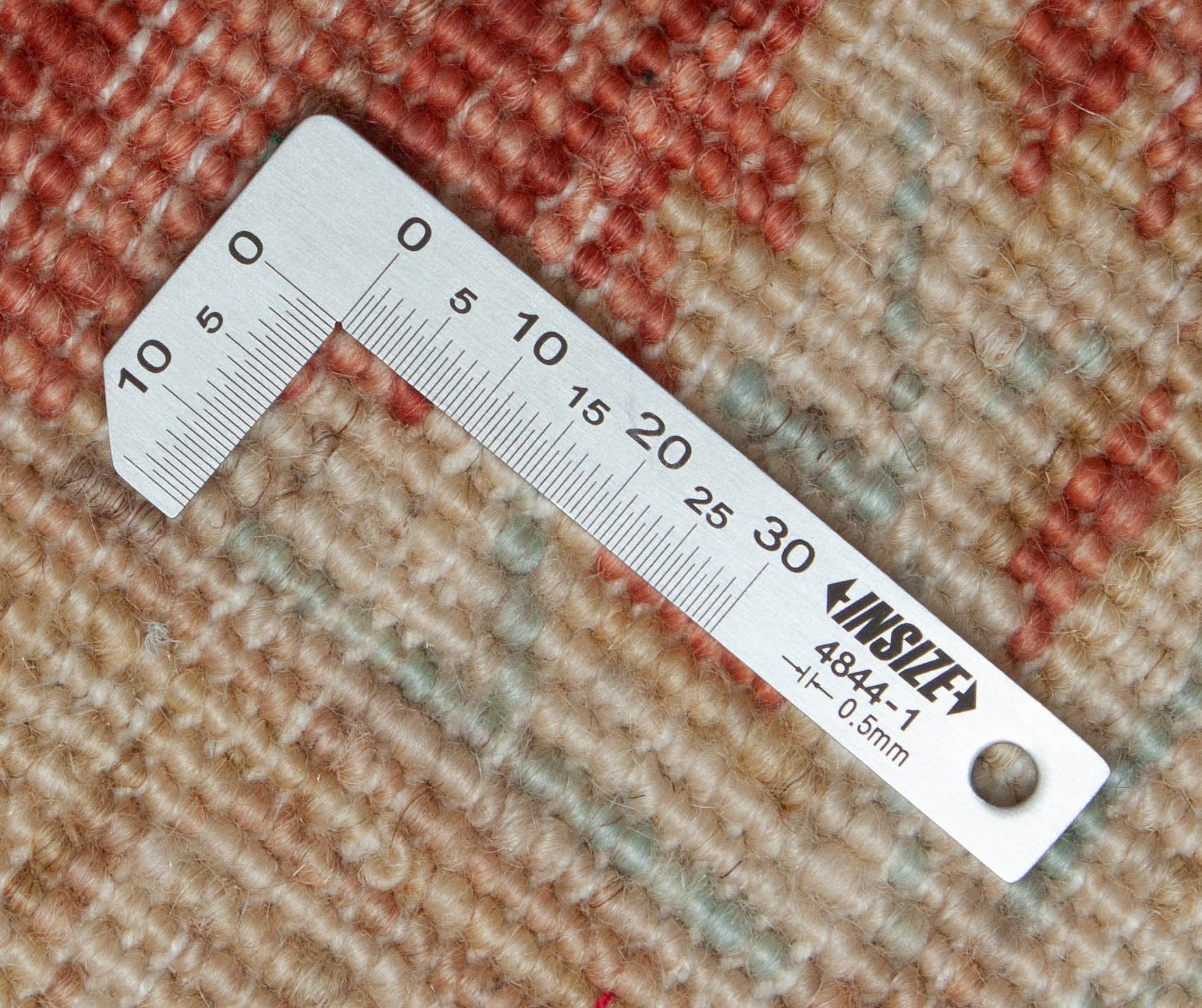 Eine Fotoaufnahme eines Farahan Teppichs.