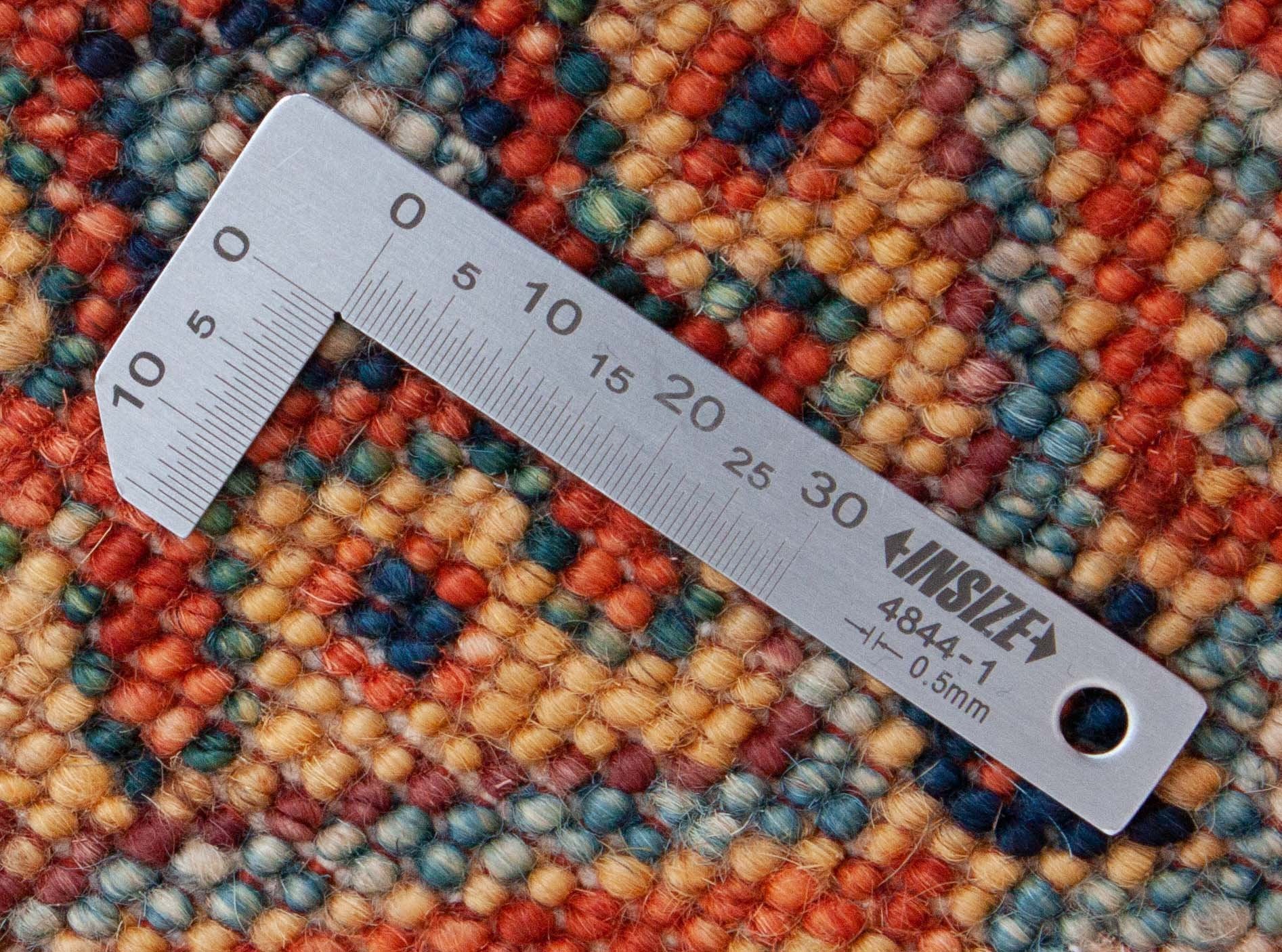 Eine Fotoaufnahme eines Oxiana Teppichs.