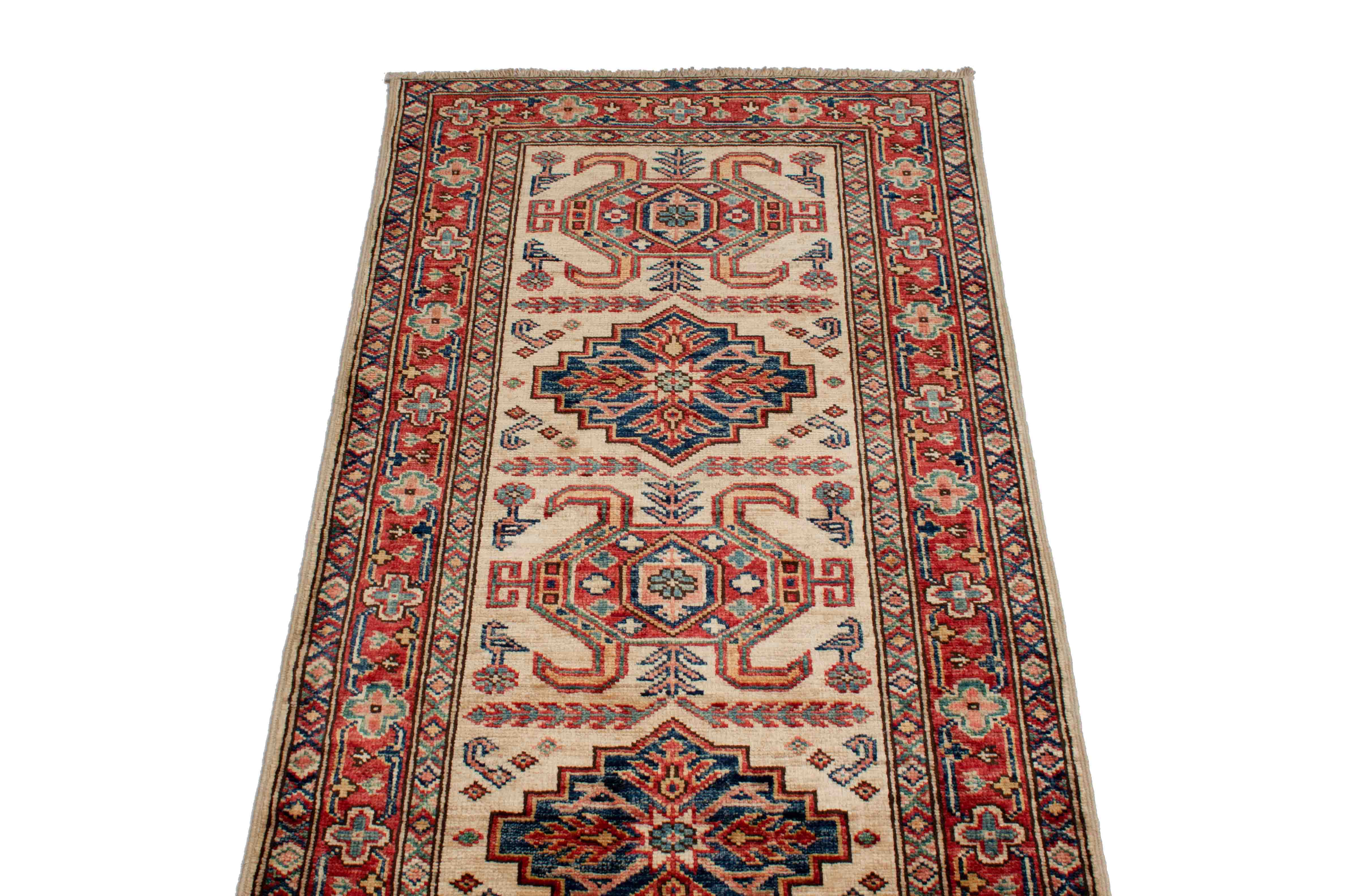 Eine Fotoaufnahme eines Kazak Teppichs.