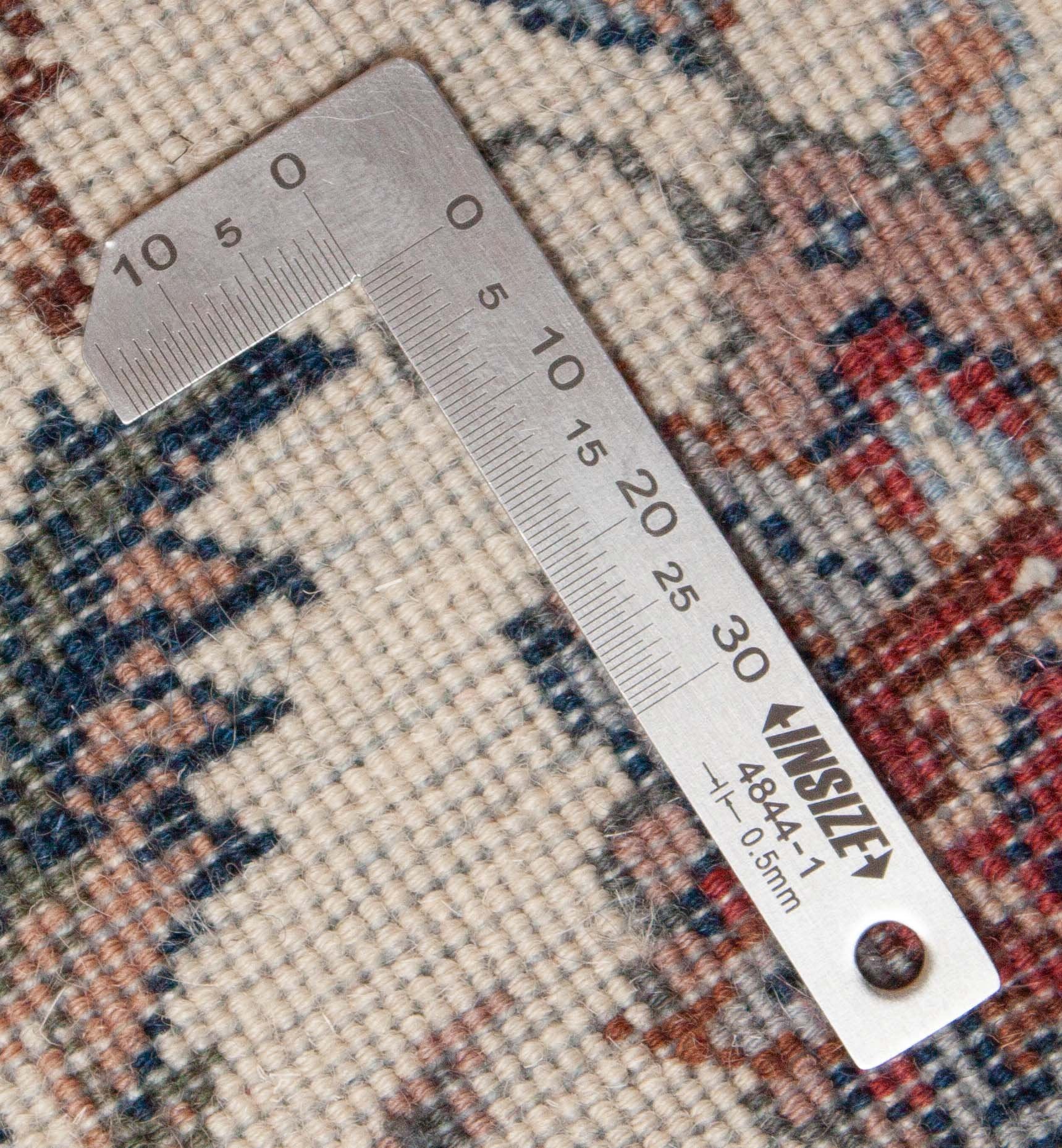 Eine Fotoaufnahme eines Keshan Teppichs.