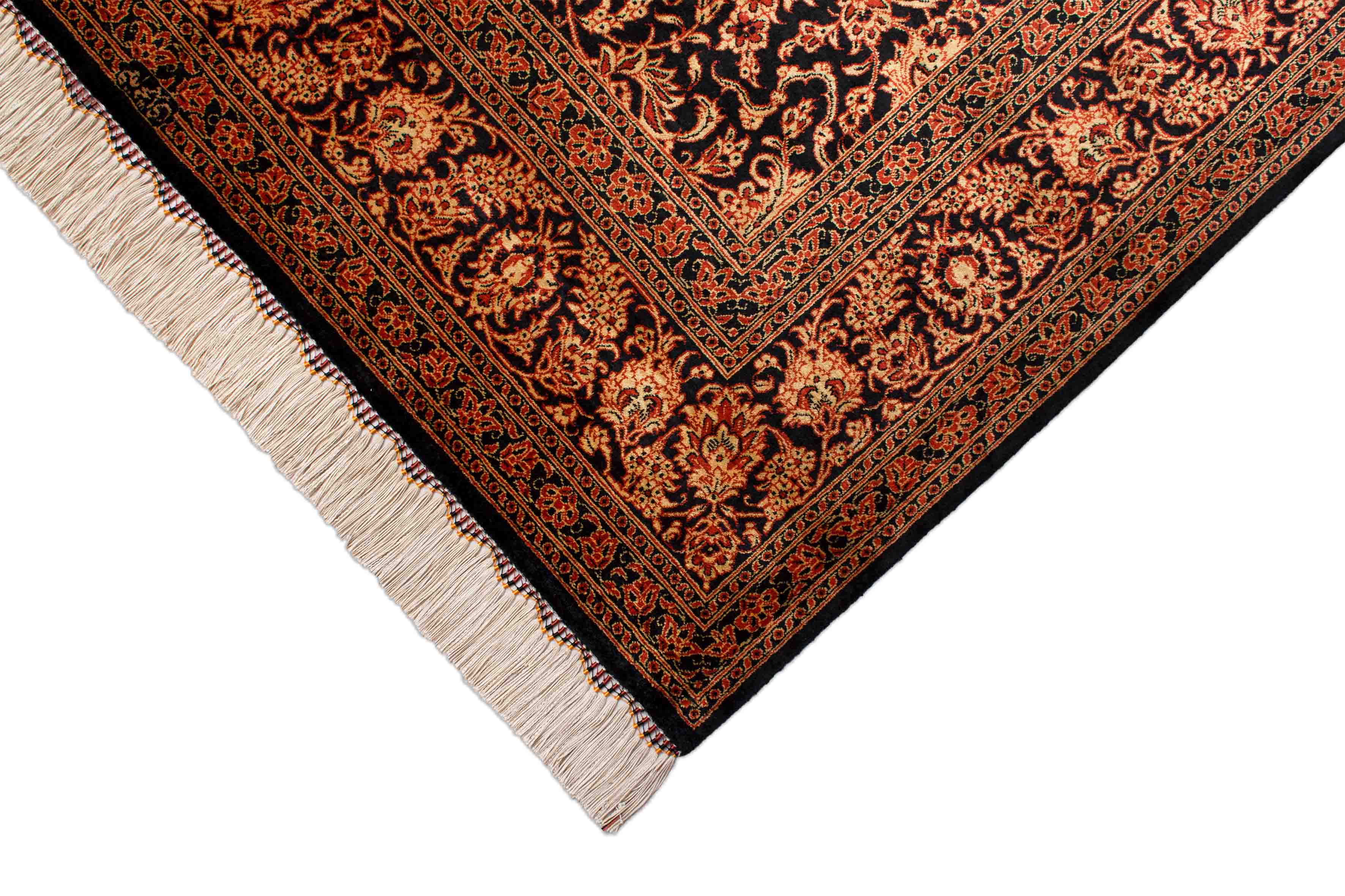 Eine Fotoaufnahme eines Ghom Teppichs.