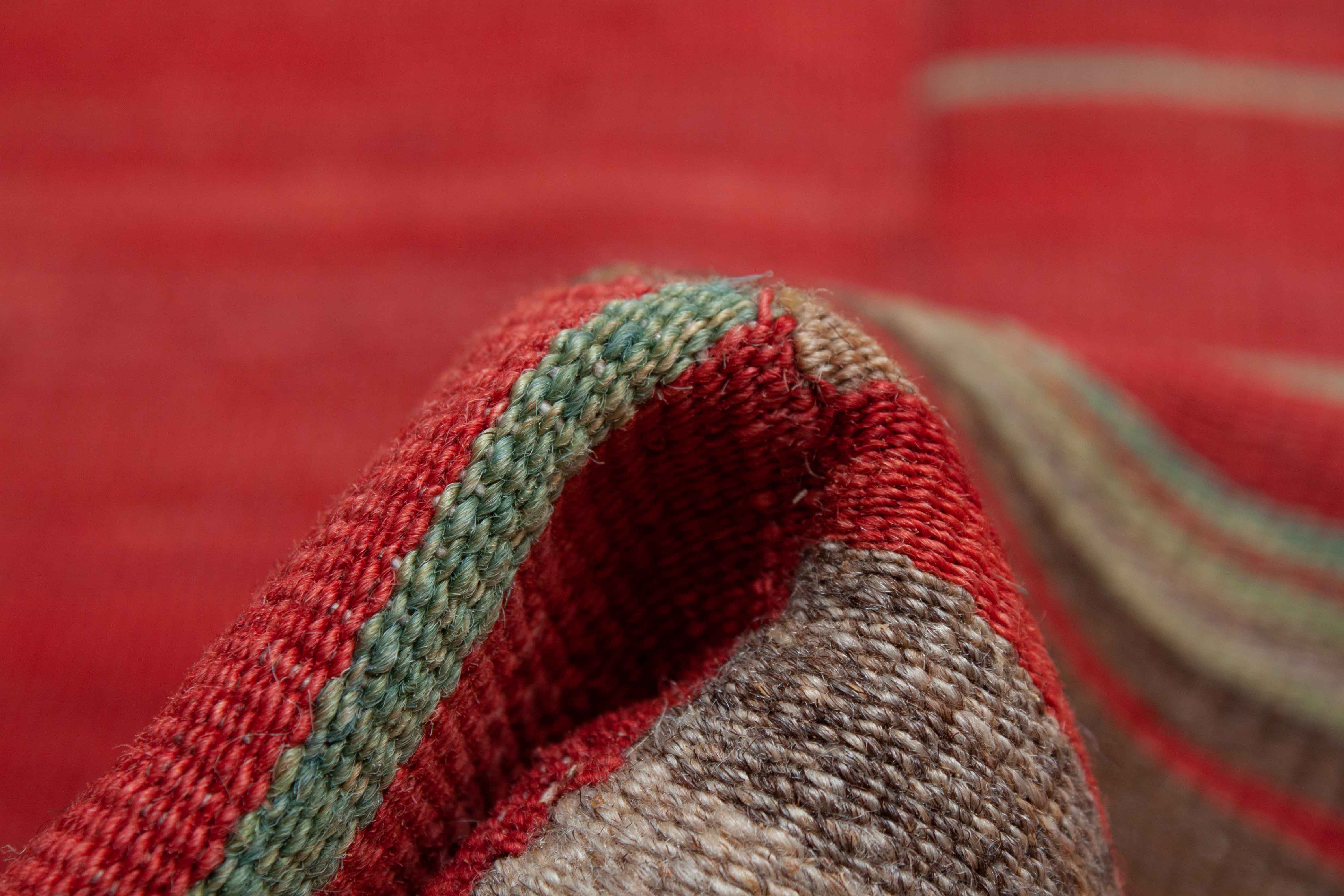 Eine Fotoaufnahme eines Kelim Teppichs.