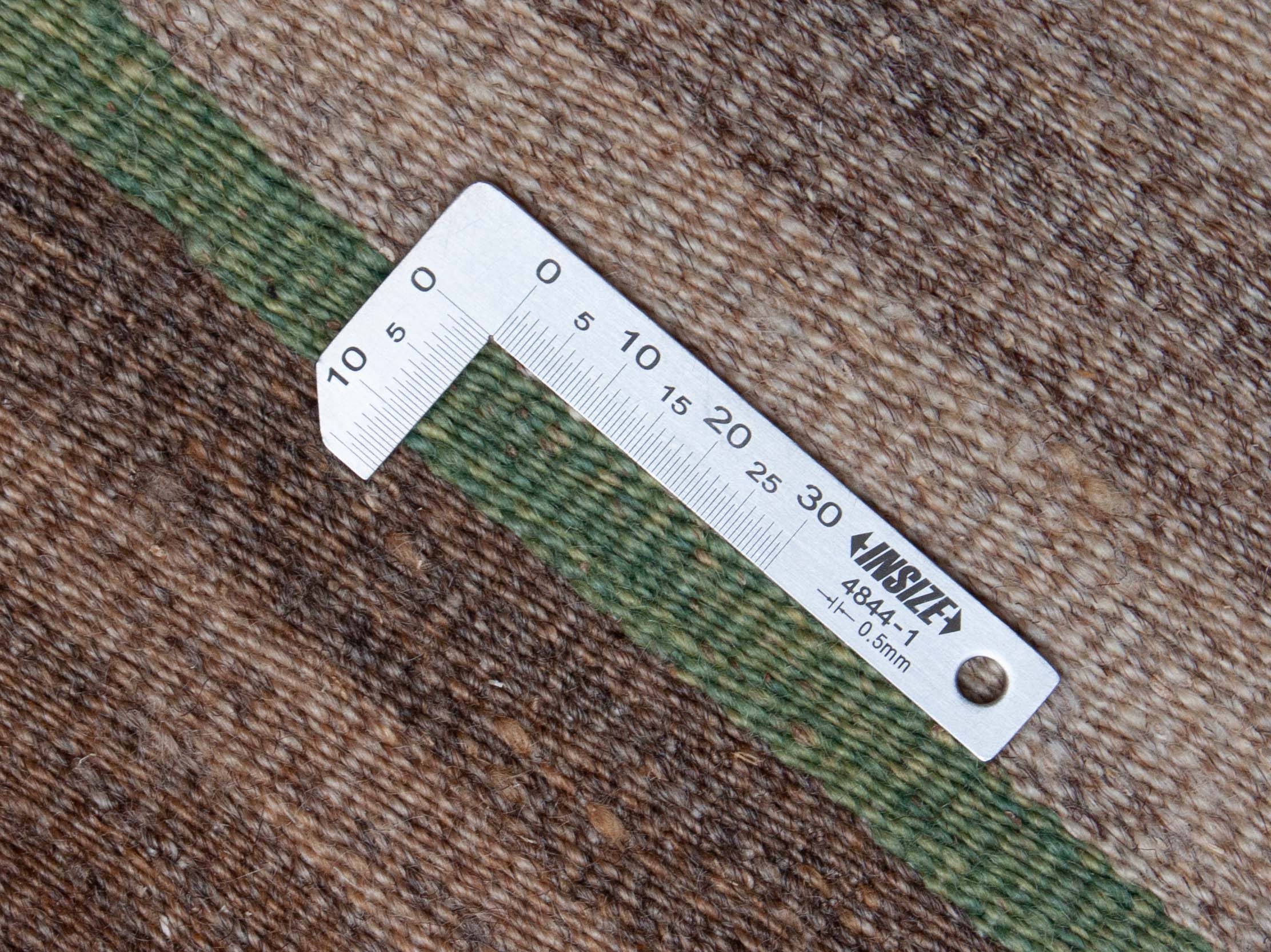 Eine Fotoaufnahme eines Kelim Teppichs.