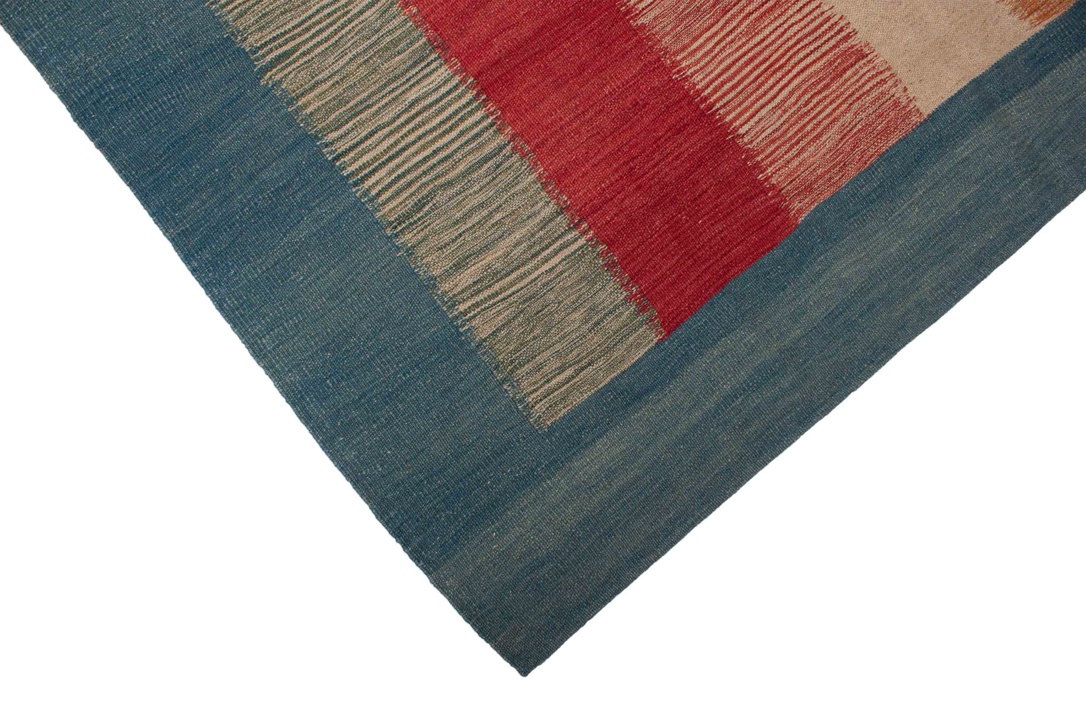 Eine Fotoaufnahme eines Kelim Teppichs.