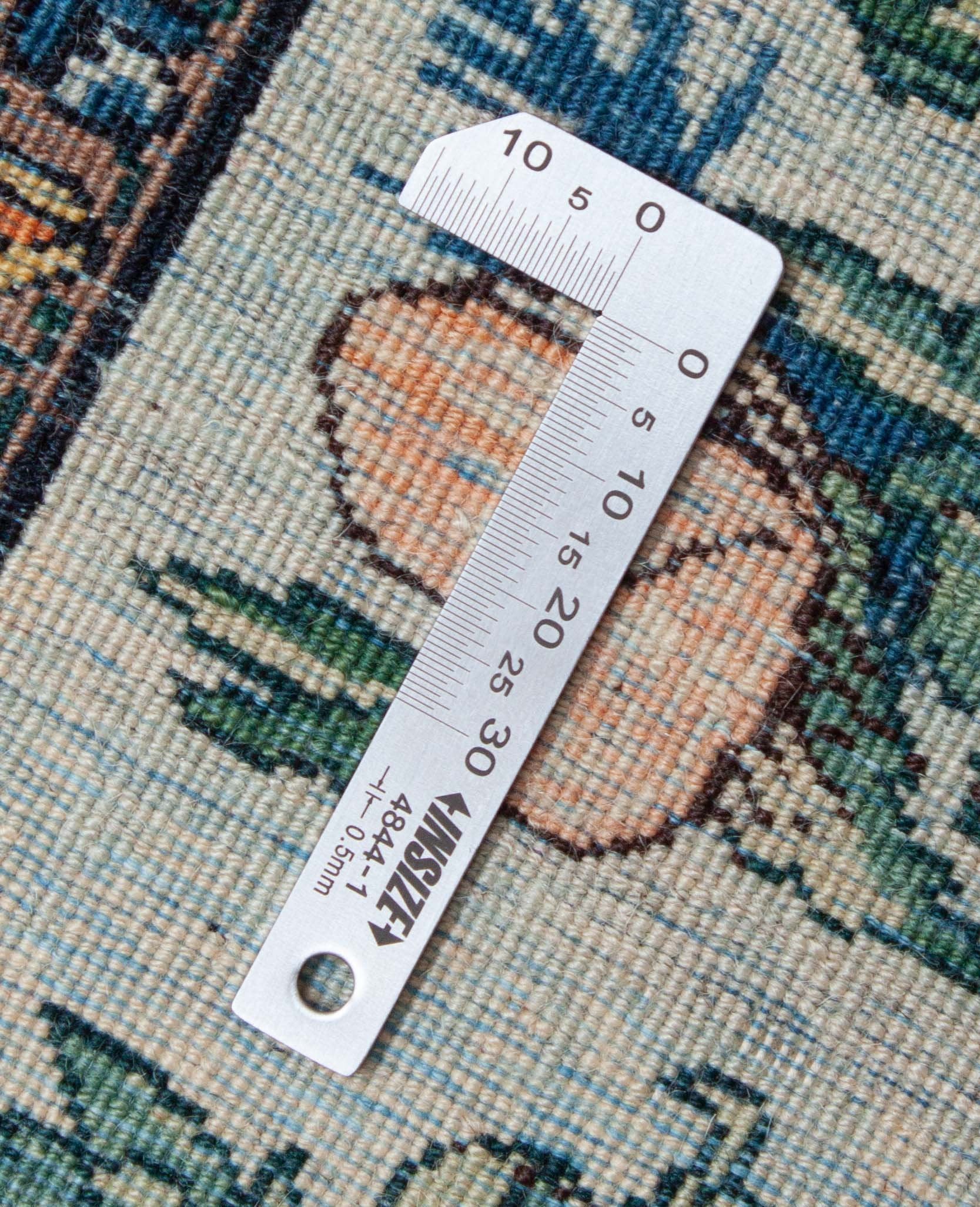 Eine Fotoaufnahme eines Kerman Teppichs.