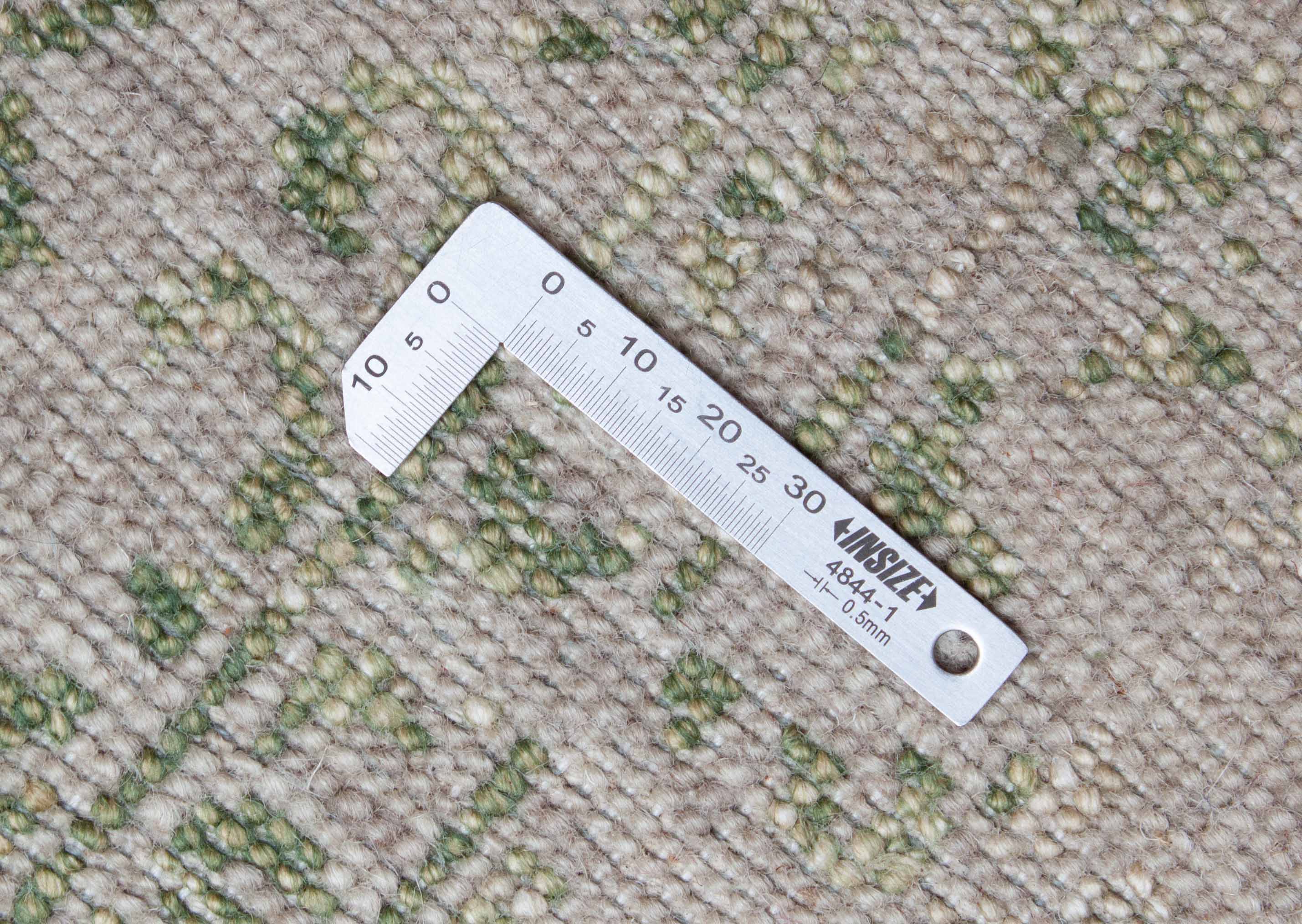 Eine Fotoaufnahme eines New Teheran Teppichs.