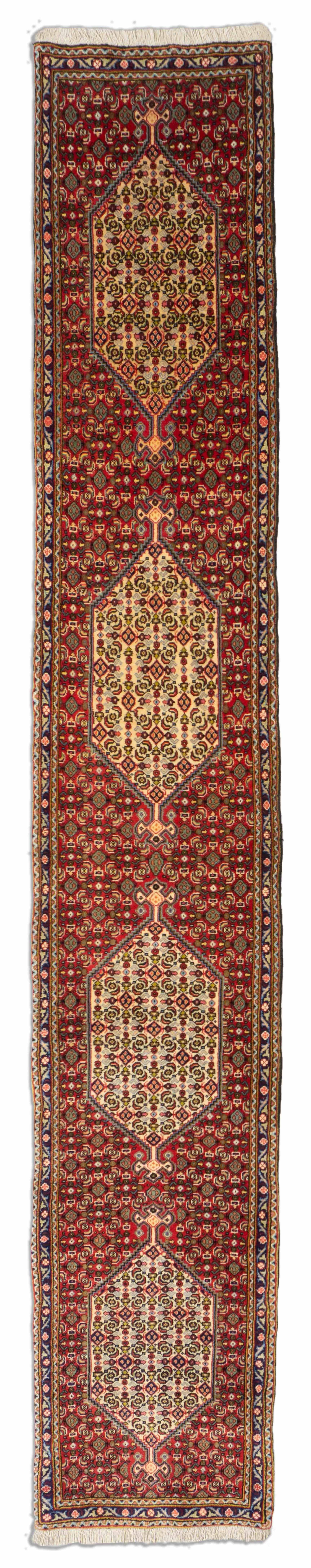 Eine Fotoaufnahme eines Senneh Teppichs.